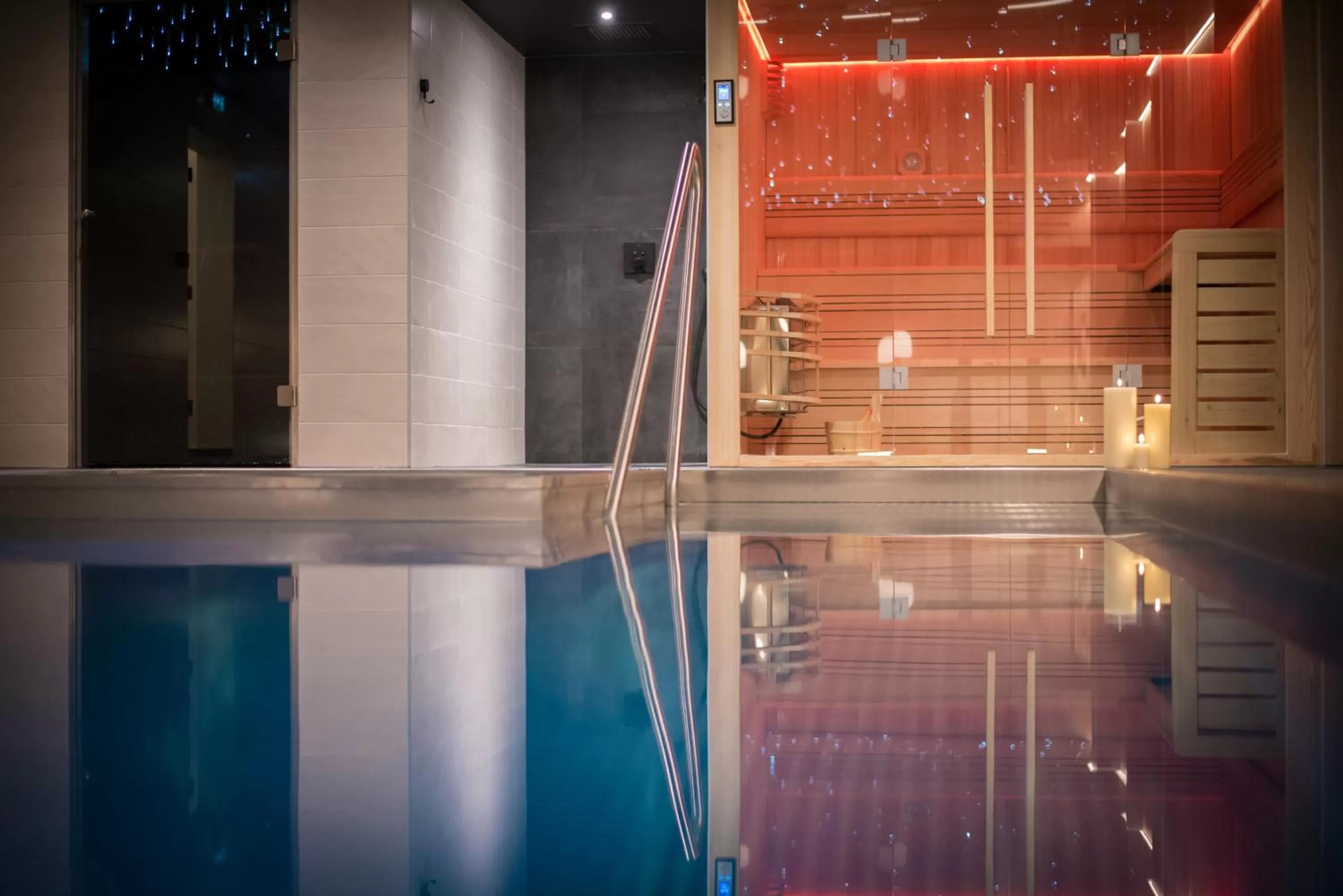 Swimming pool in L' Hôtel & Spa Ribeauville- Haut-Koenigsbourg