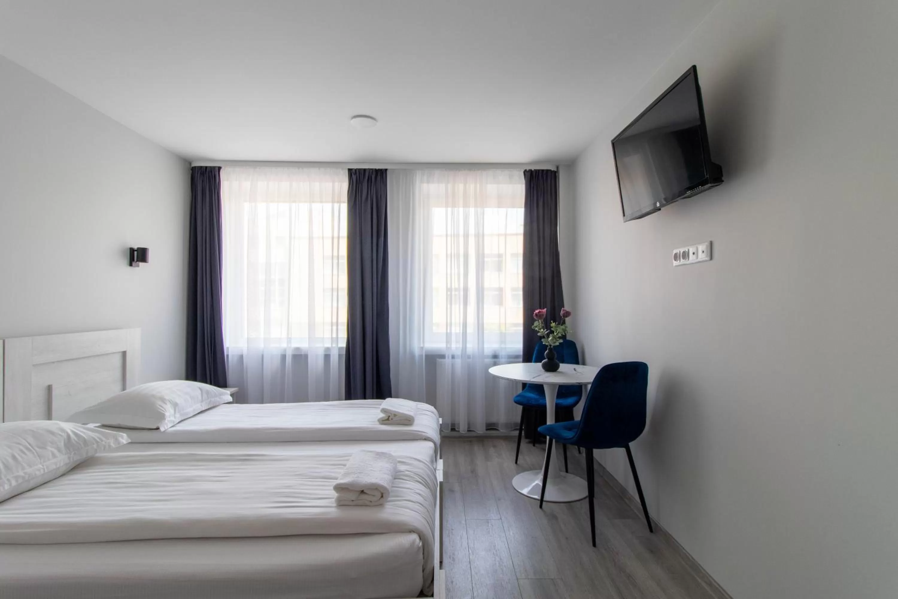 Bed in Dzukija Hotel