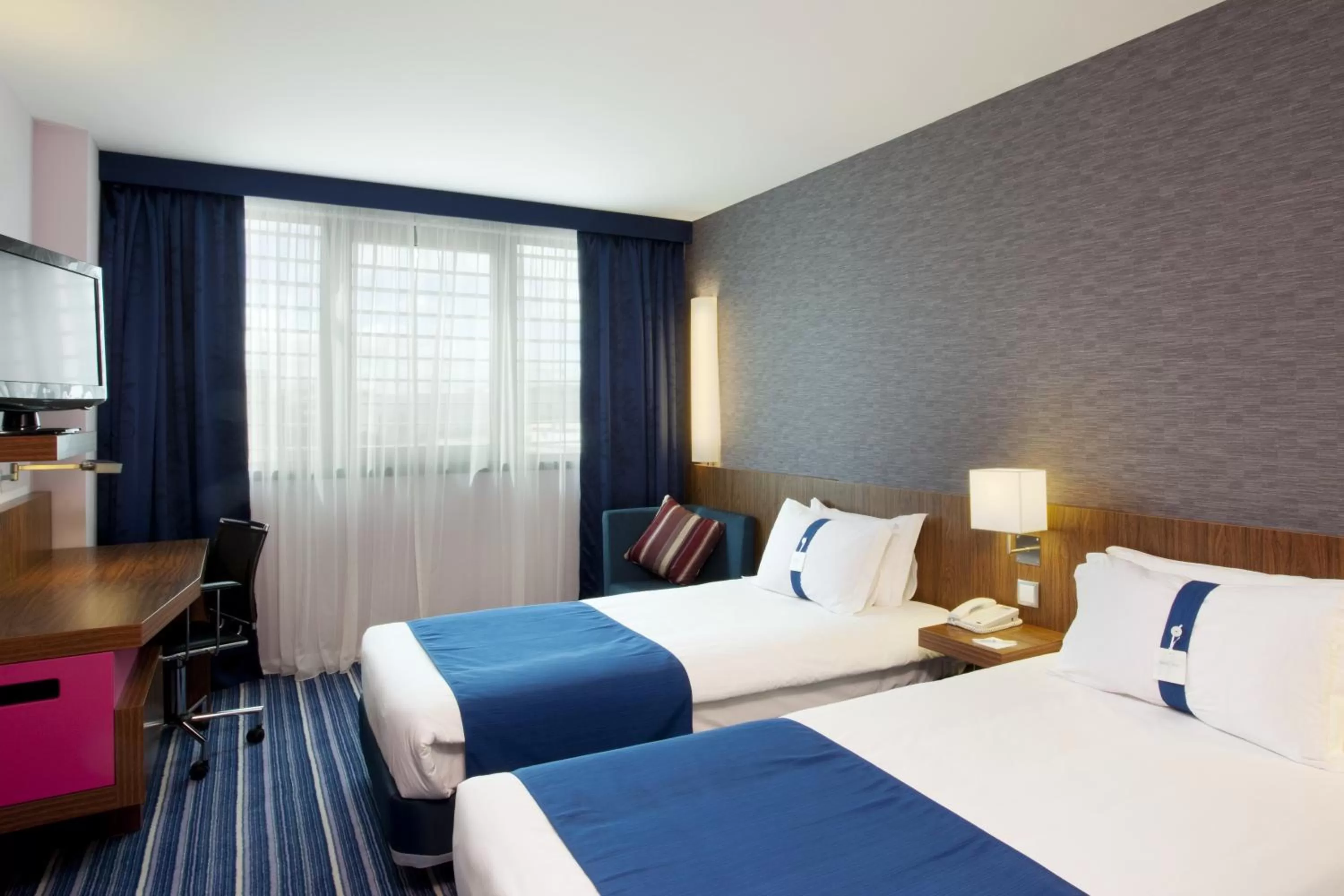 Photo of the whole room, Bed in Holiday Inn Express Lisbon Airport by IHG