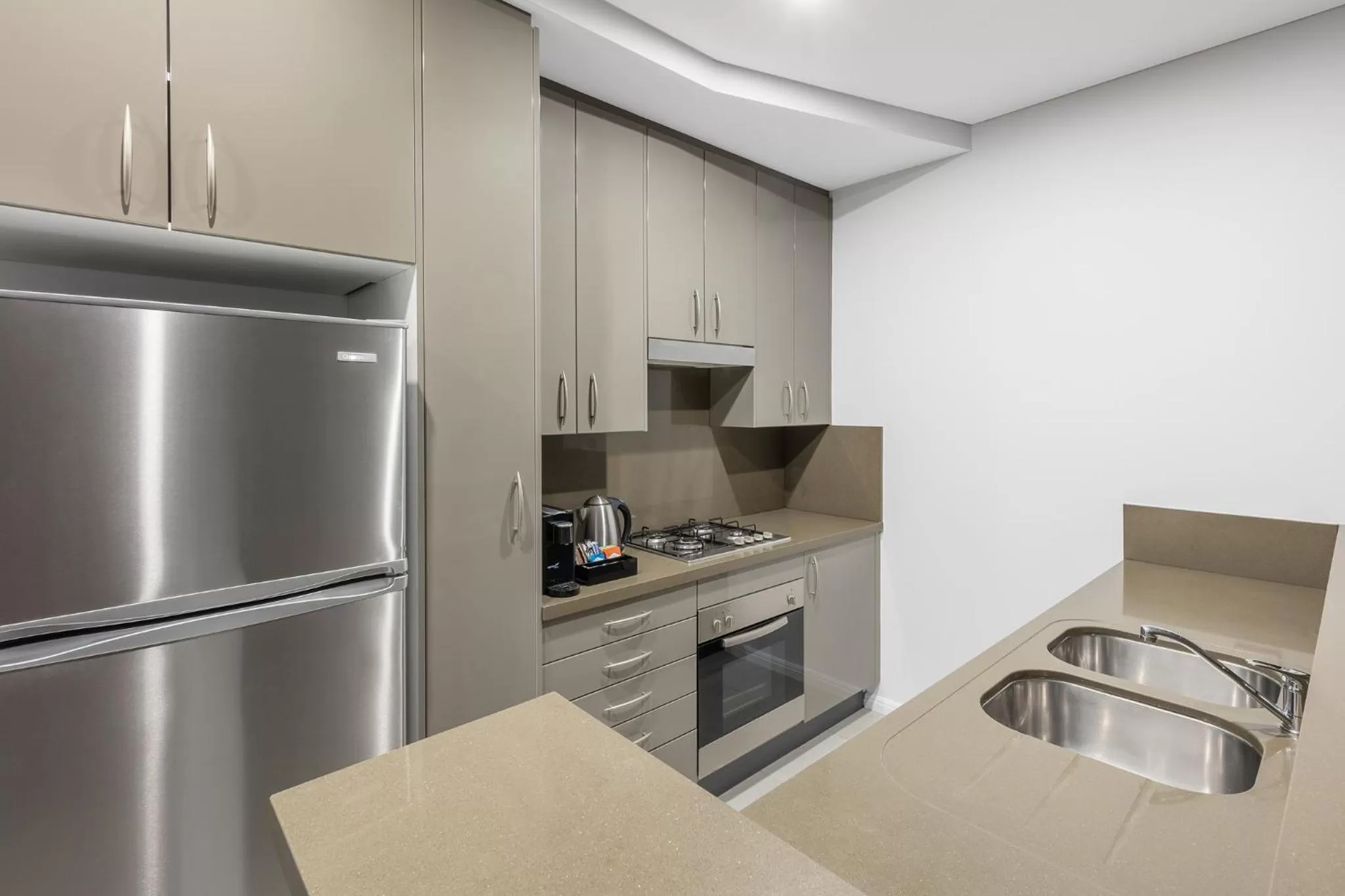 Kitchen or kitchenette in Meriton Suites Kent Street, Sydney