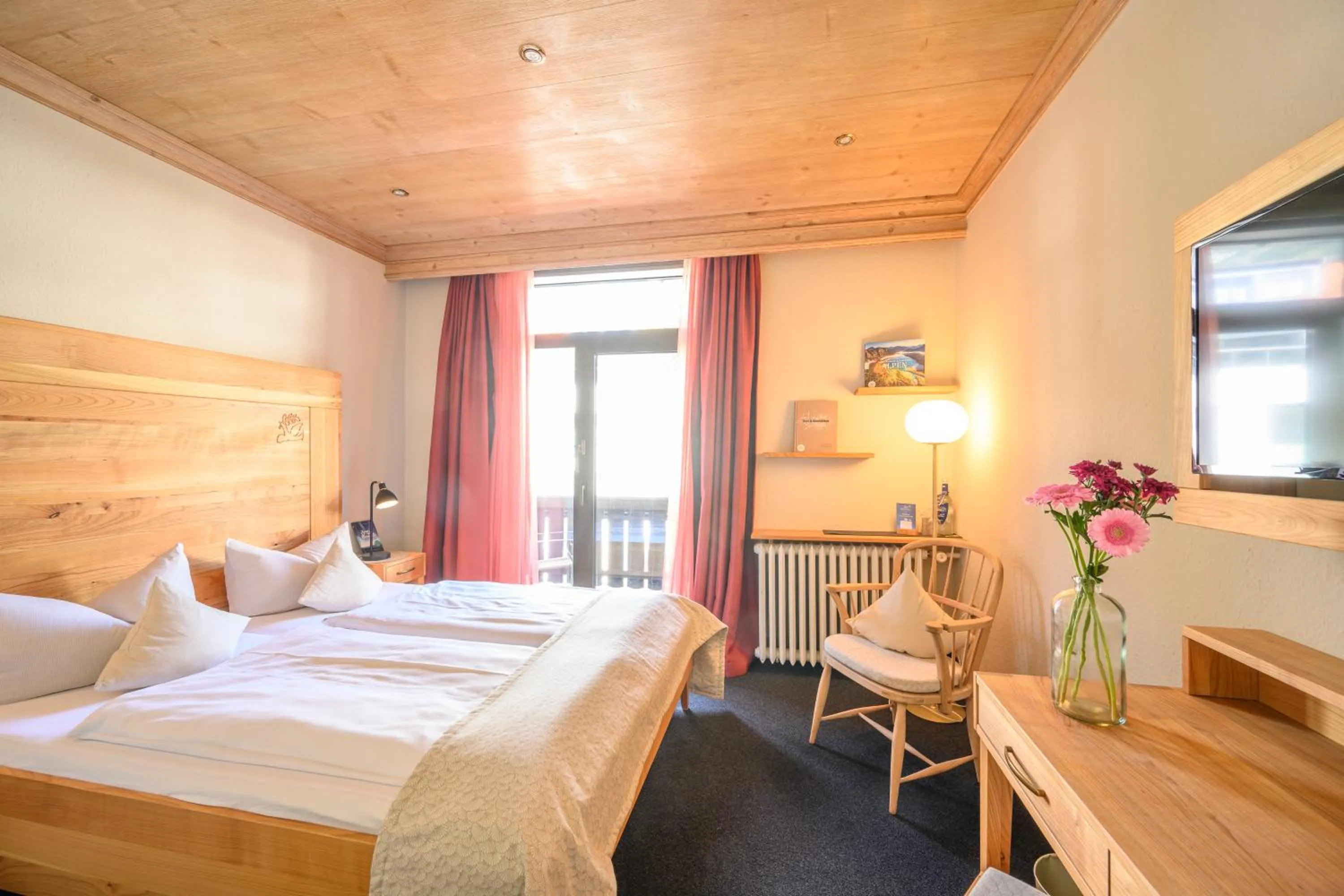 Photo of the whole room, Bed in Biohotel Garmischer Hof