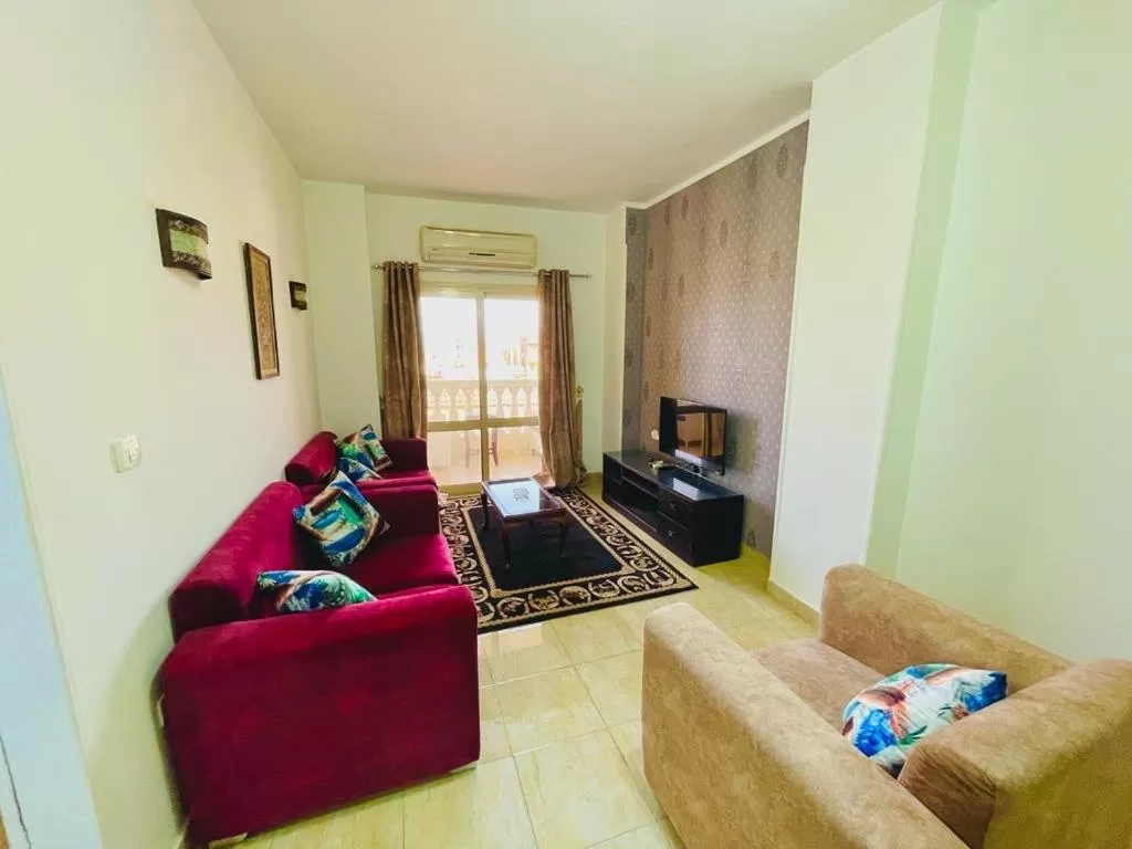 TV and multimedia, Seating Area in Charbel apartments