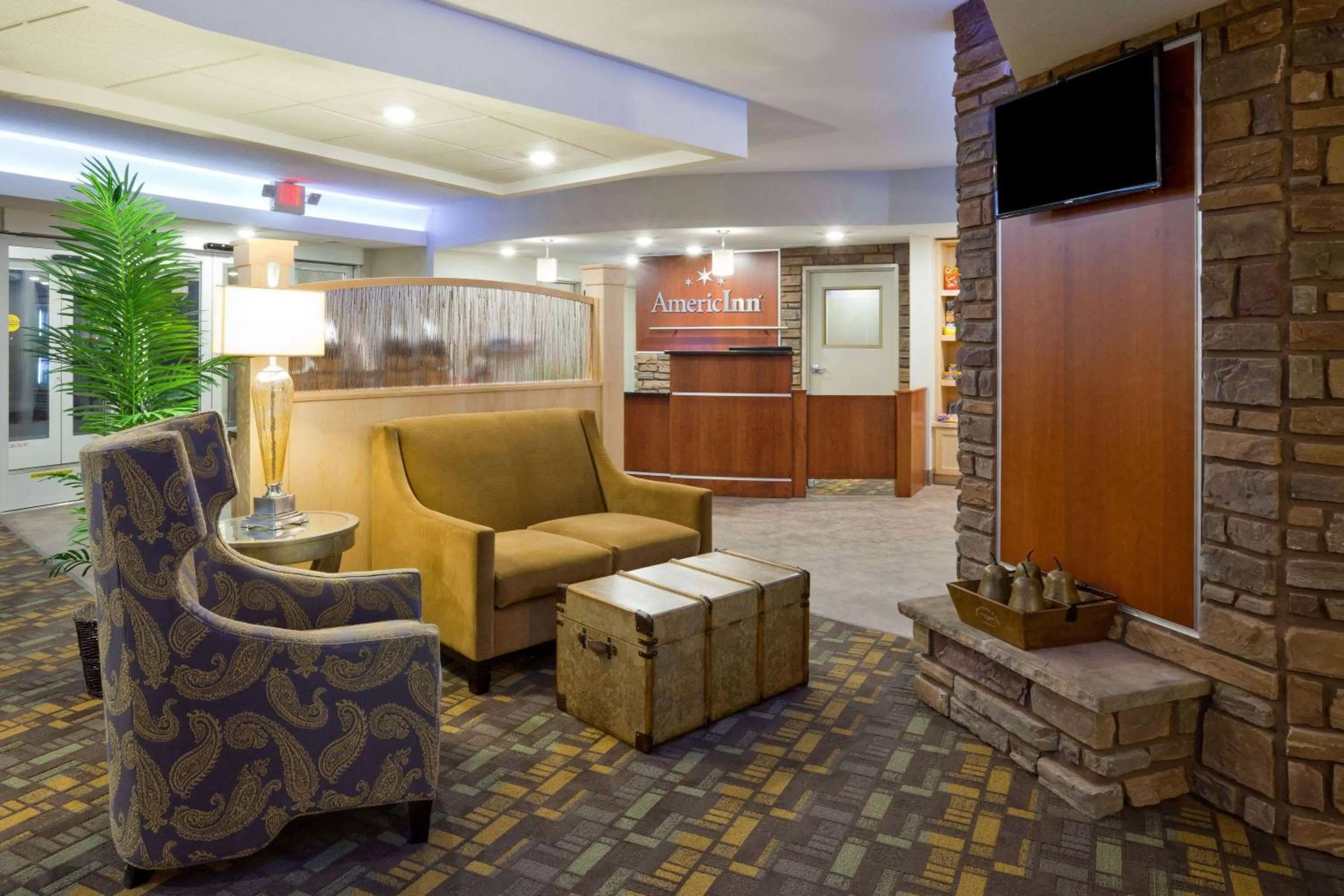 Seating area in AmericInn by Wyndham Hartford SD
