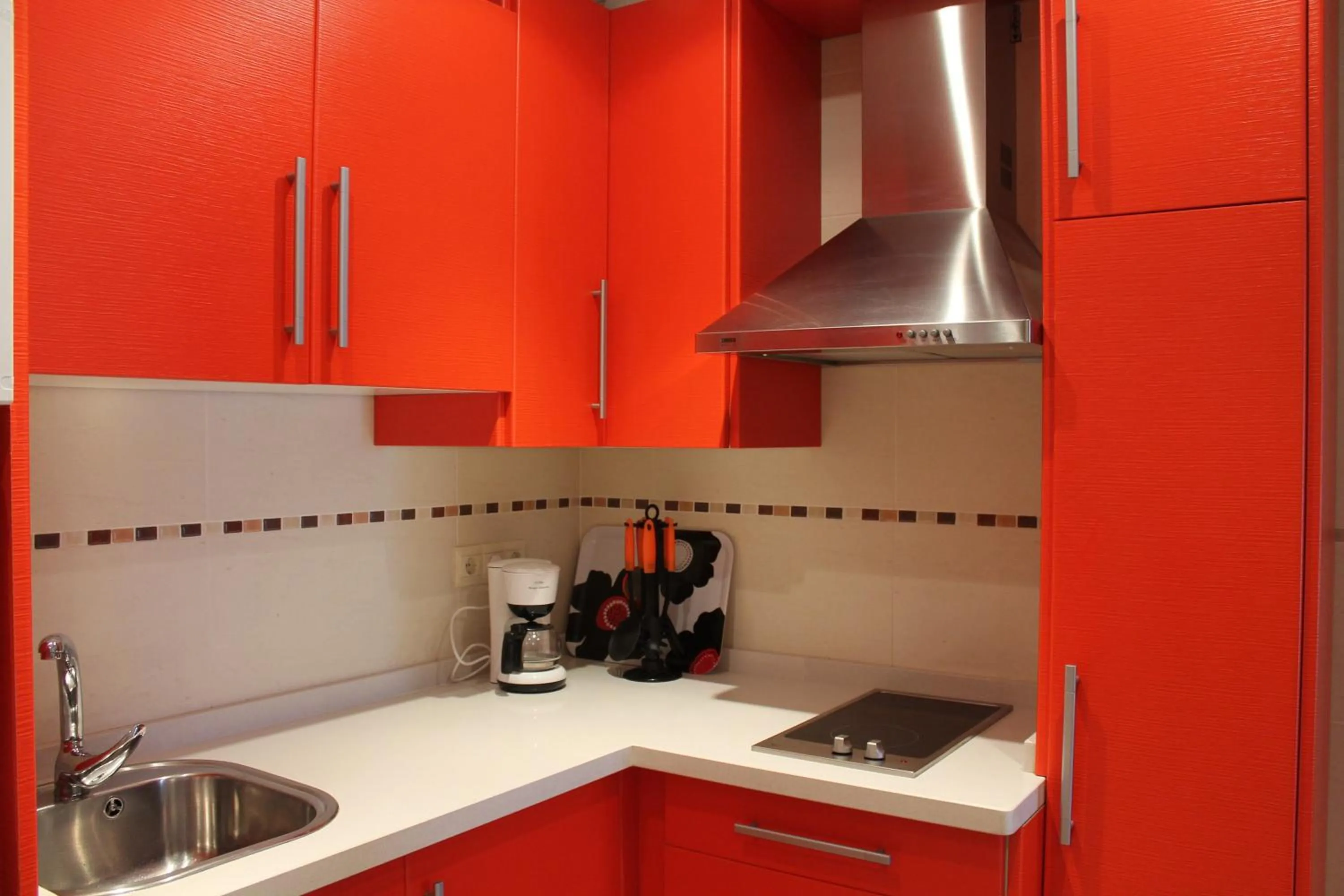 Kitchen or kitchenette in Apartamentos Turísticos Plaza del Olvido