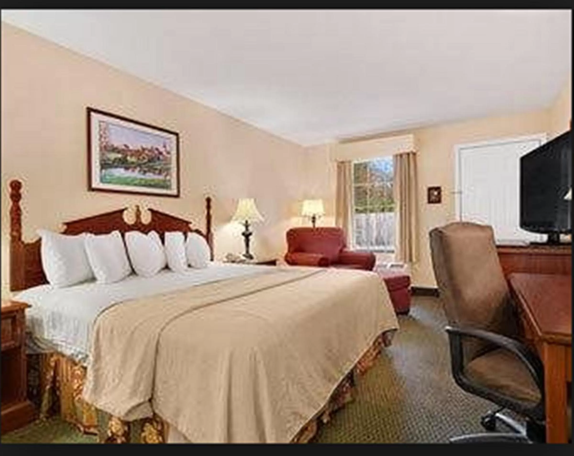 Photo of the whole room, Bed in Baymont by Wyndham Sanford
