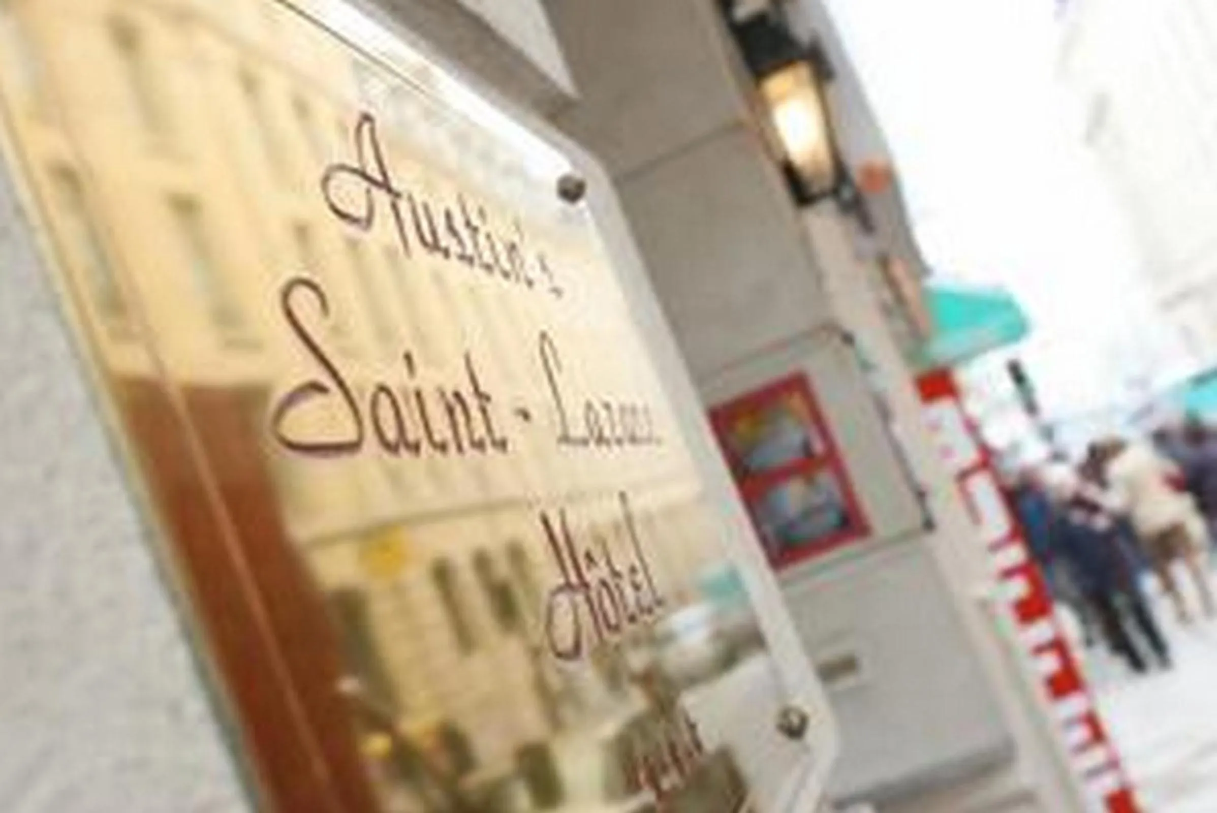 Facade/entrance in Austin's Saint Lazare Hotel