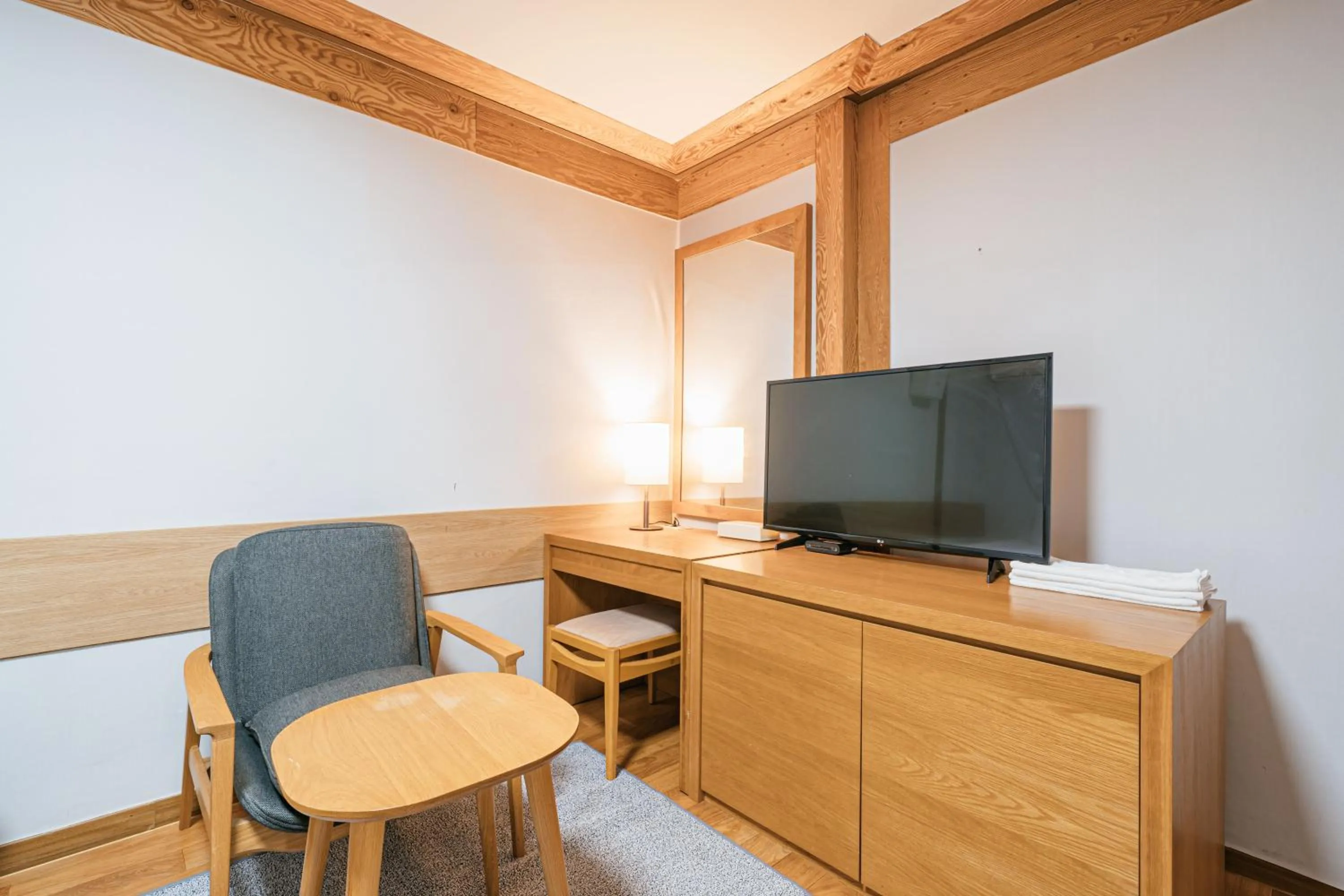 TV/Entertainment Center in Miju Hotel