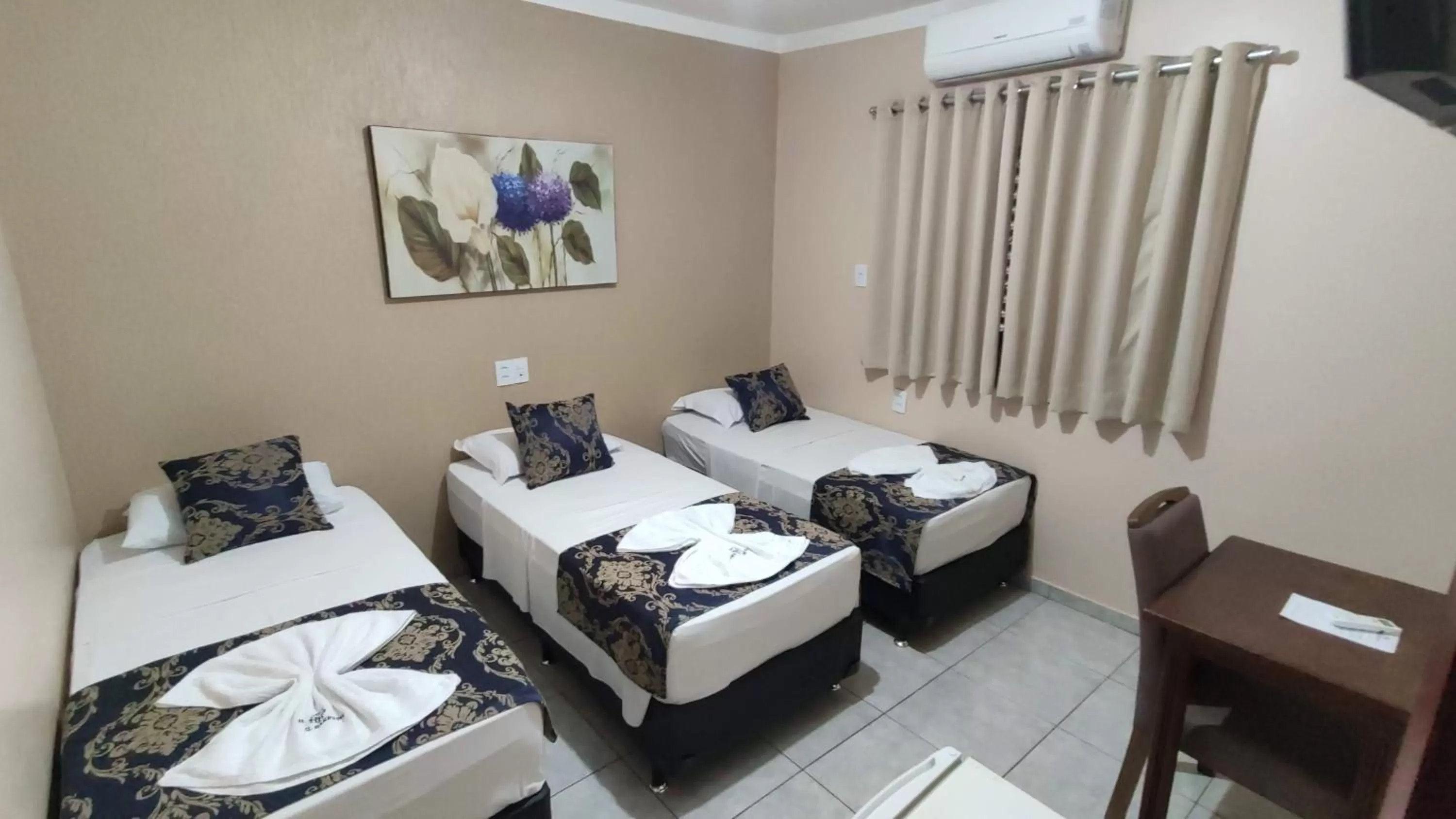 Bed in Hotel Barretos