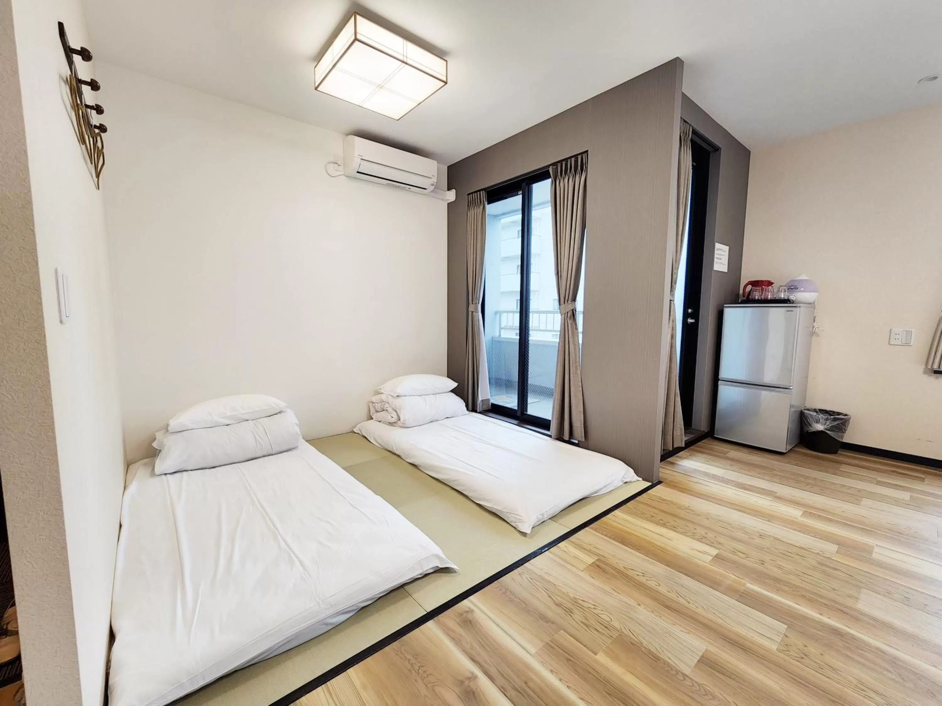 Photo of the whole room, Bed in KYU KYU HOTEL