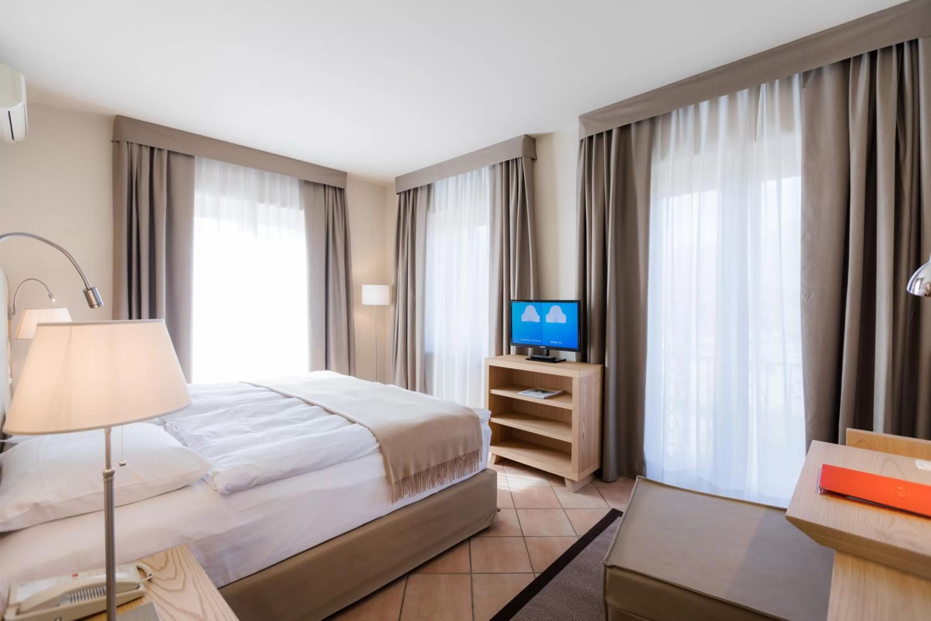 Bedroom, Bed in Parkhotel Delta, Wellbeing Resort