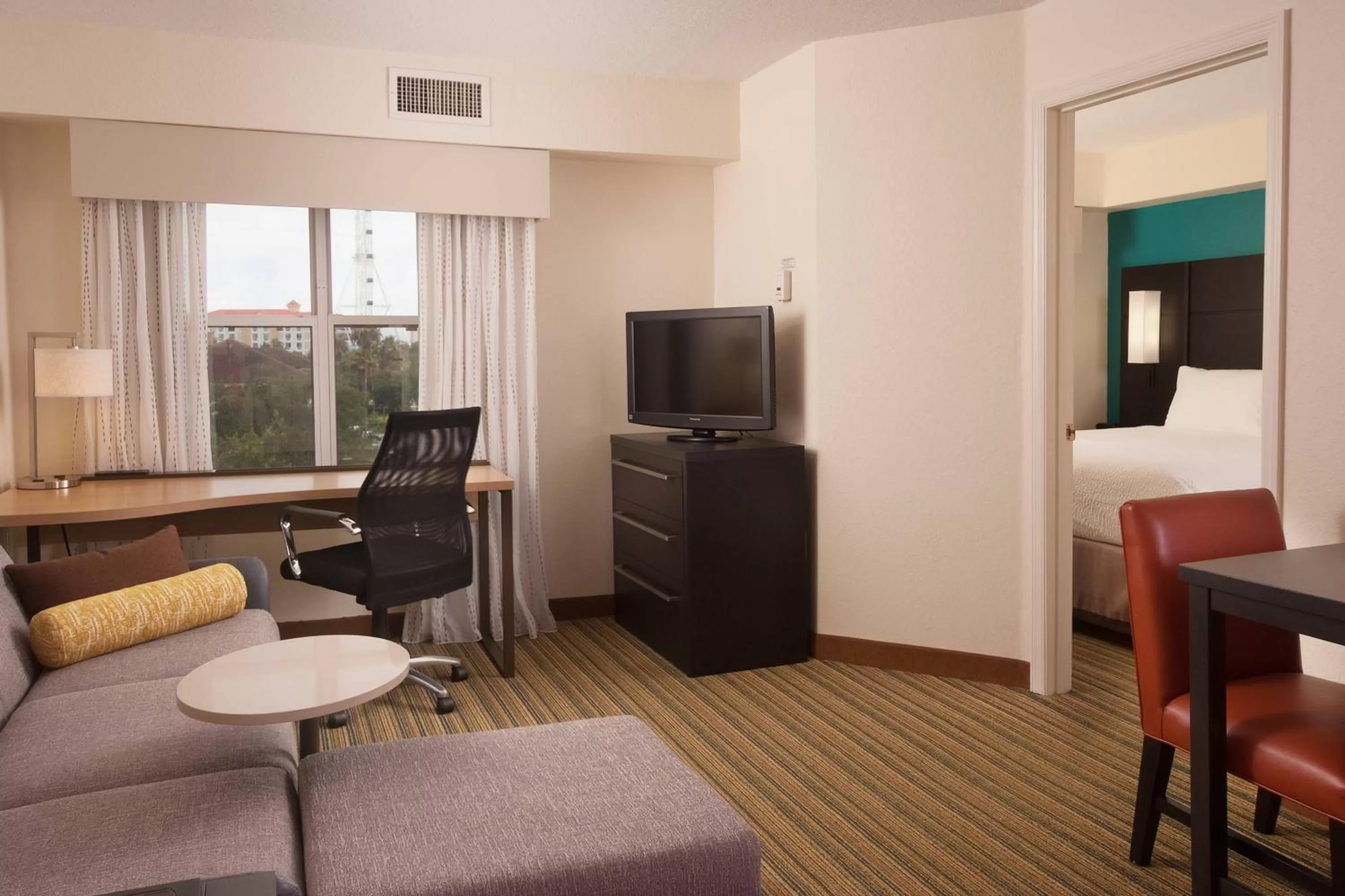 One-Bedroom King Suite with Sofa Bed and Adapted Tub - Mobility and Hearing Accessible in Residence Inn Orlando Convention Center