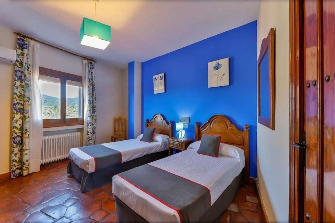 Bed in Hostal Alfonso XI