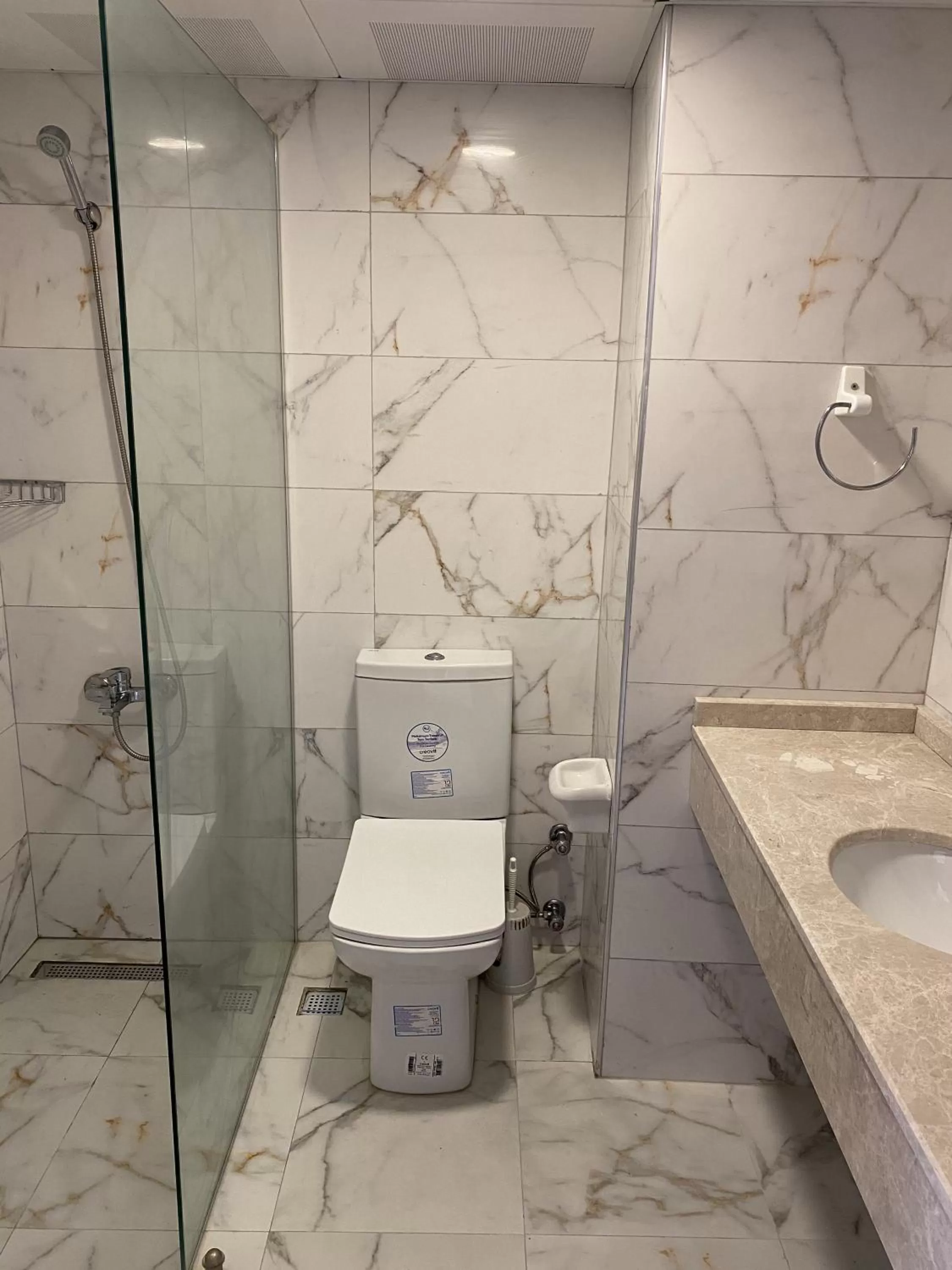 Bathroom in Tuntas Family Suites Kusadasi