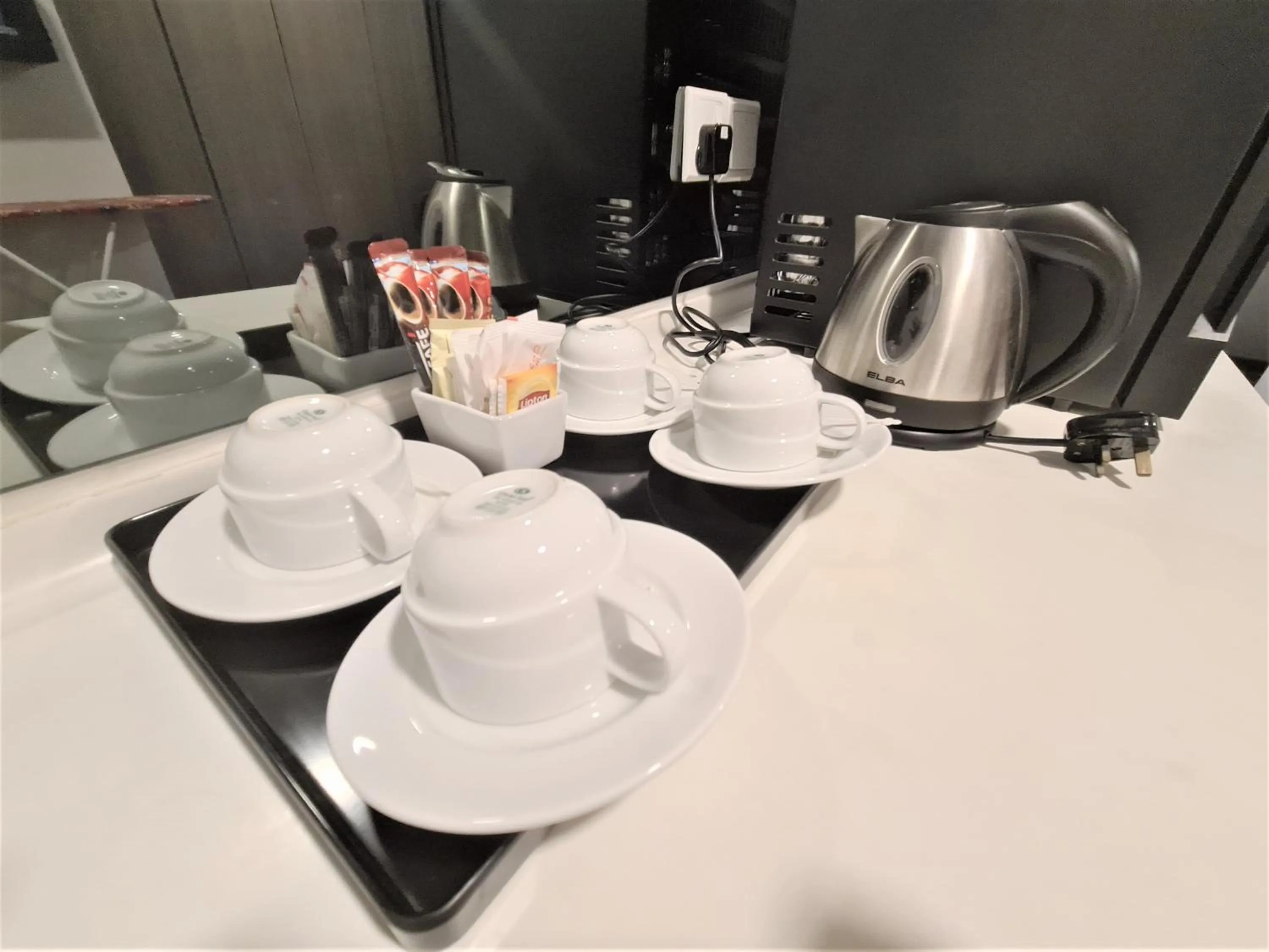 Coffee/tea facilities in Nexus Regency Suites & Hotel