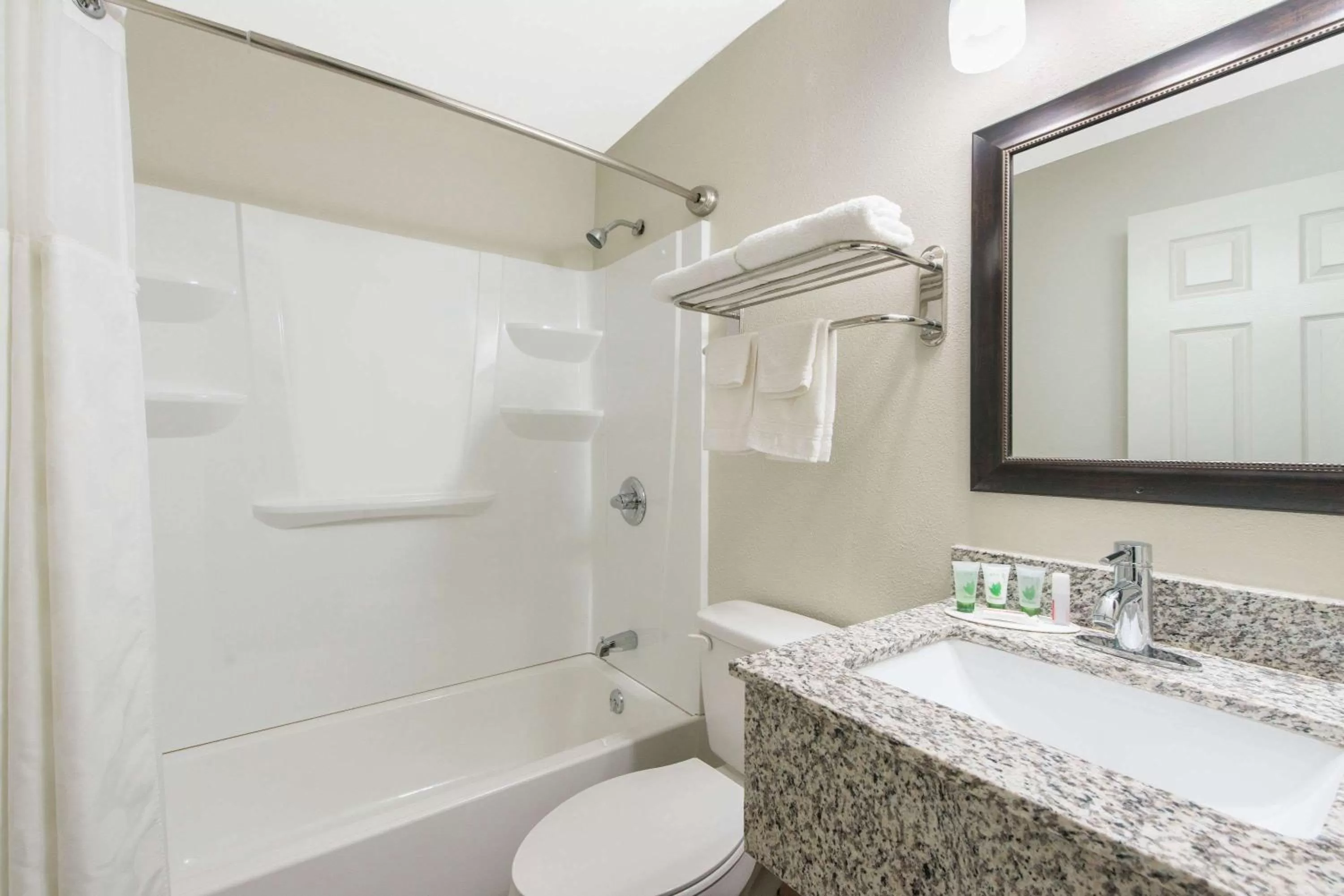 Bathroom in Super 8 by Wyndham Moberly MO