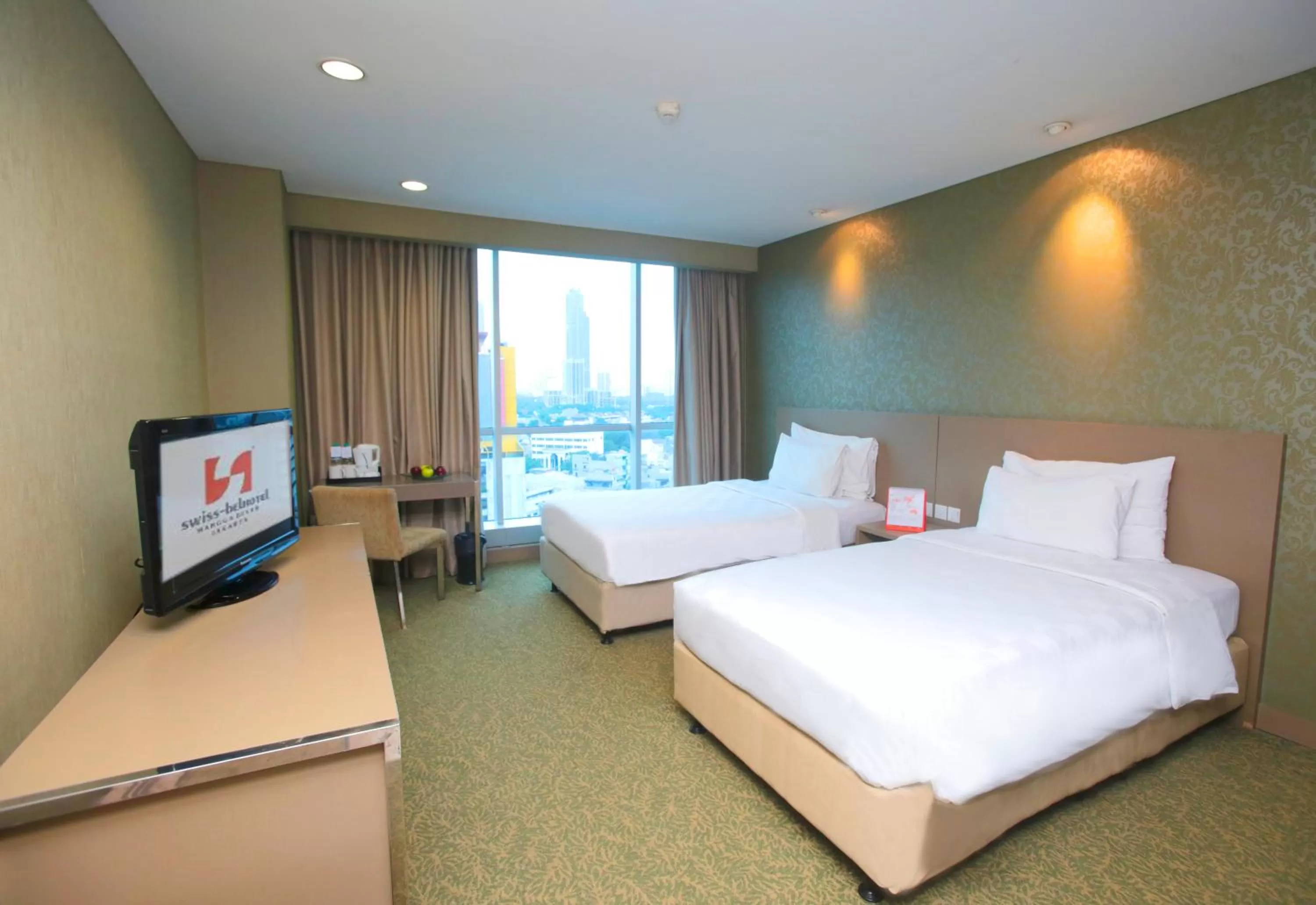 Photo of the whole room in Swiss-Belhotel Mangga Besar
