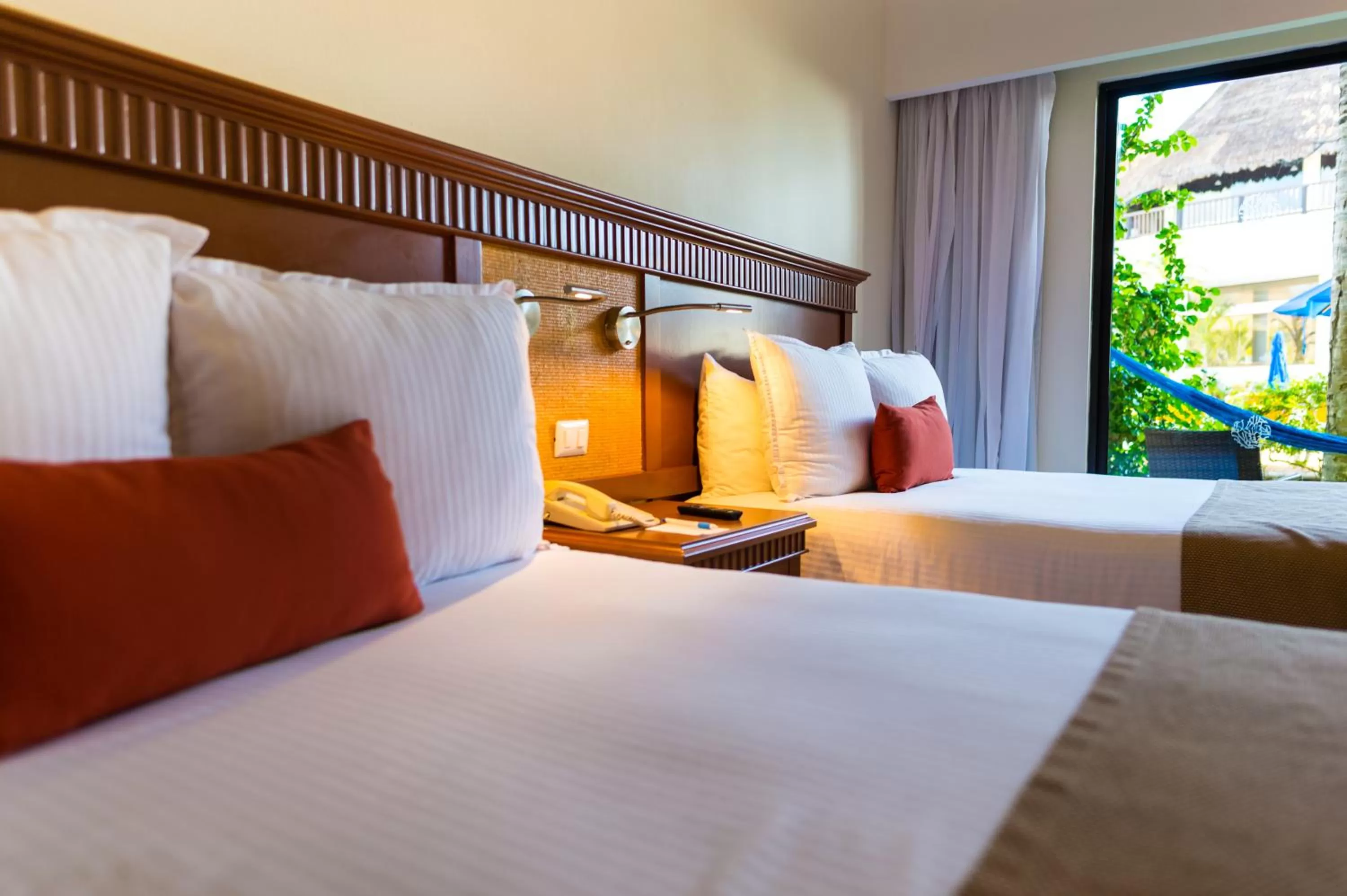 Bed in The Reef Coco Beach Resort & Spa- Optional All Inclusive