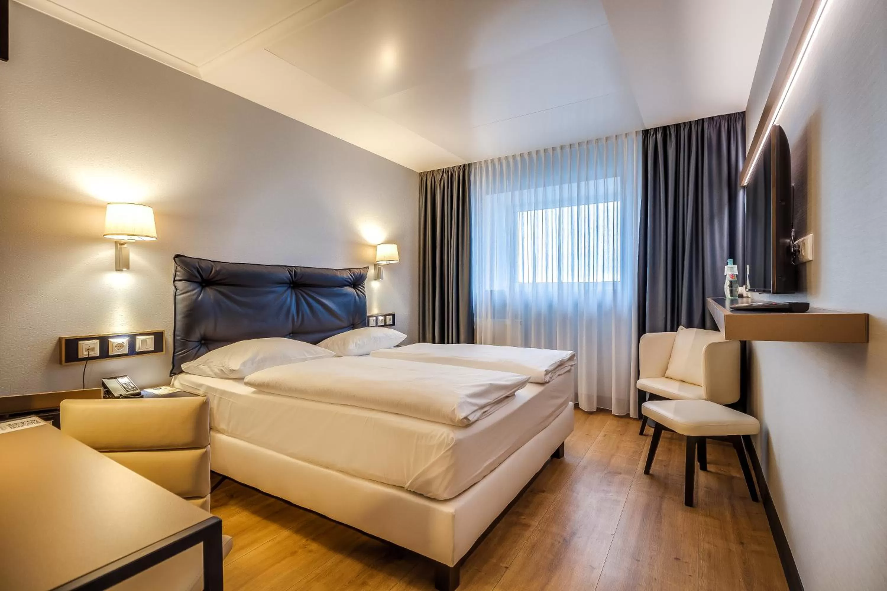 Photo of the whole room, Bed in Congress Hotel Chemnitz