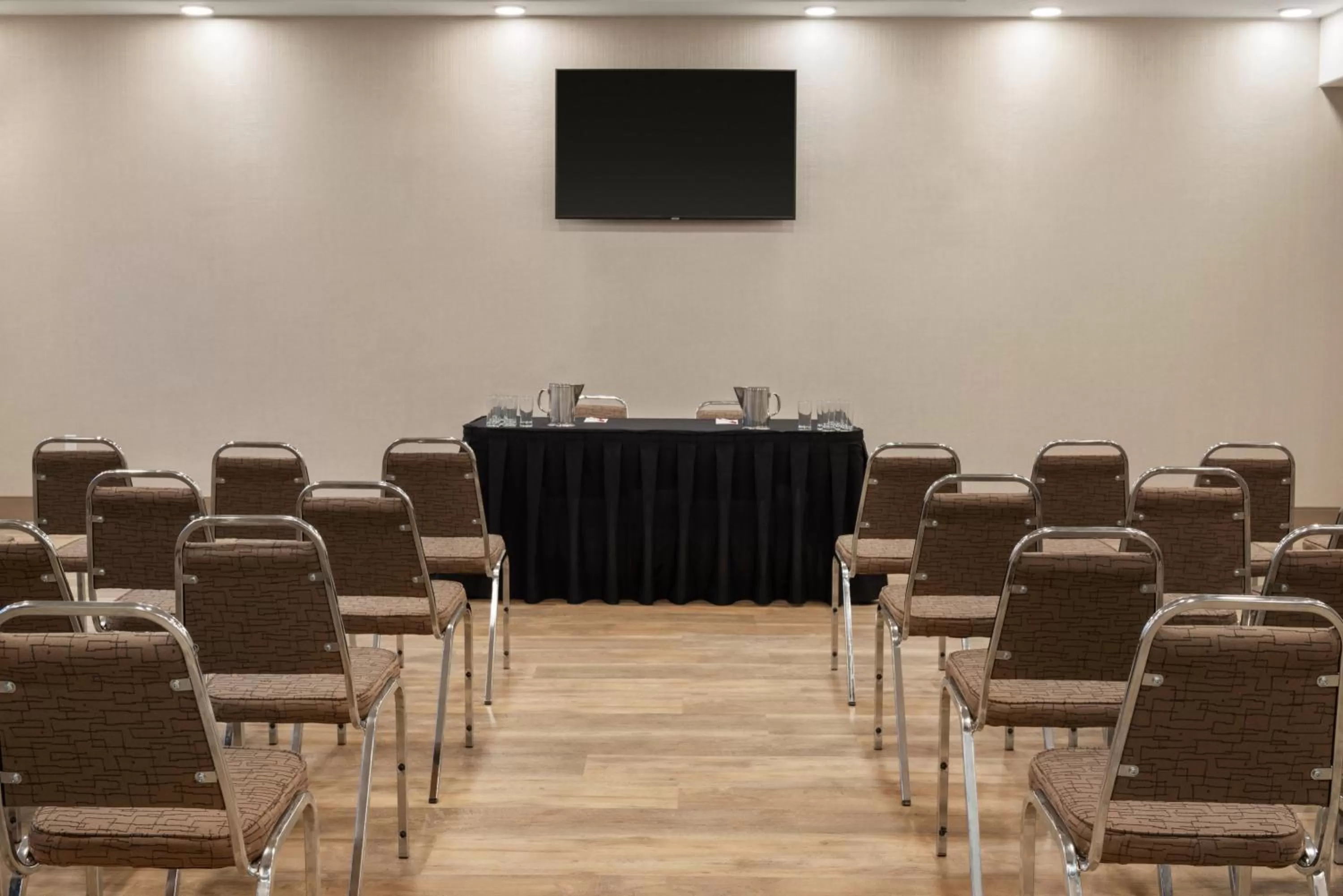 Meeting/conference room in Ramada by Wyndham Airdrie Hotel & Suites
