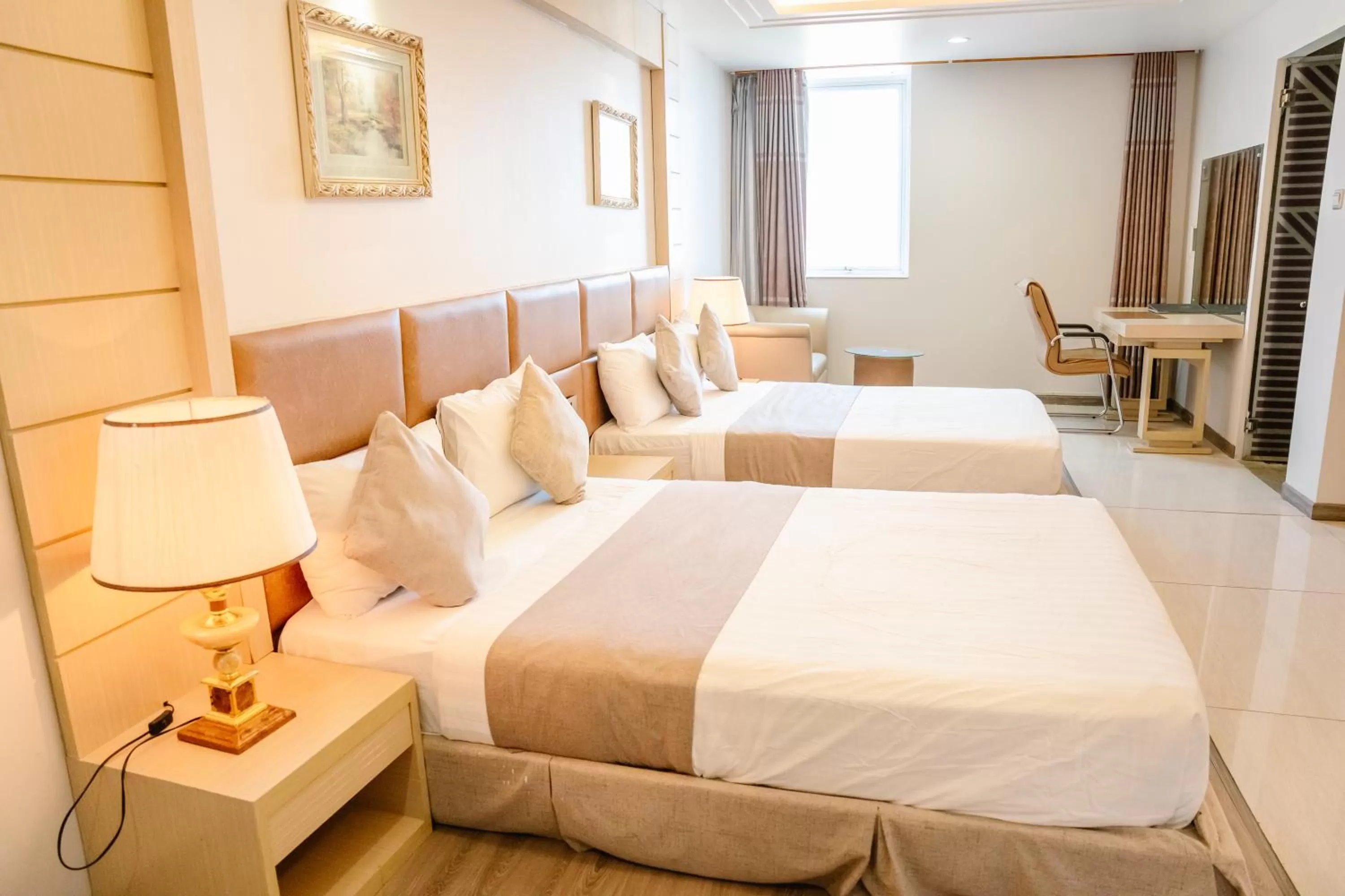 Bed in Holiday One Can Tho Hotel