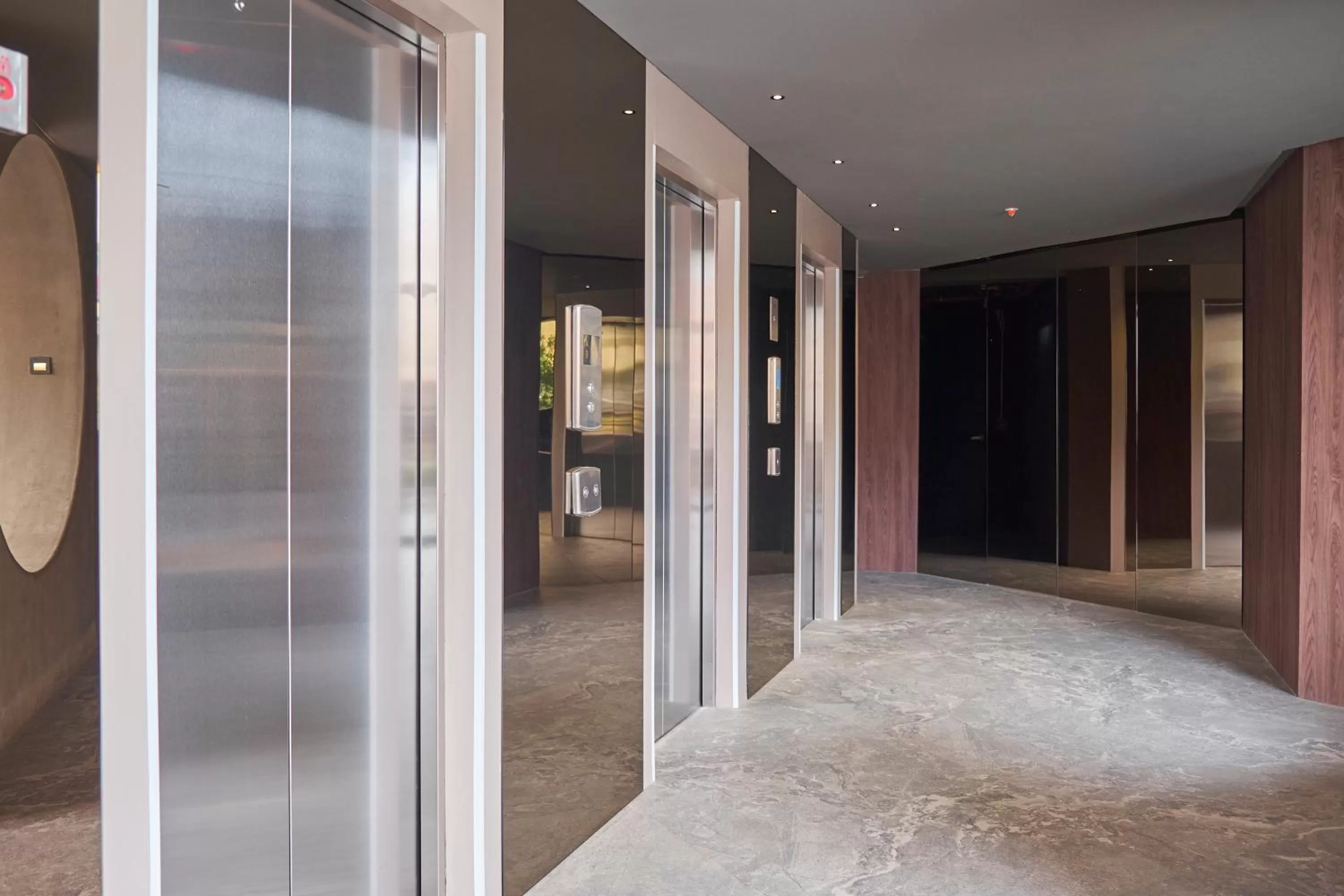 elevator in ICON 100 Luxury Apartasuites