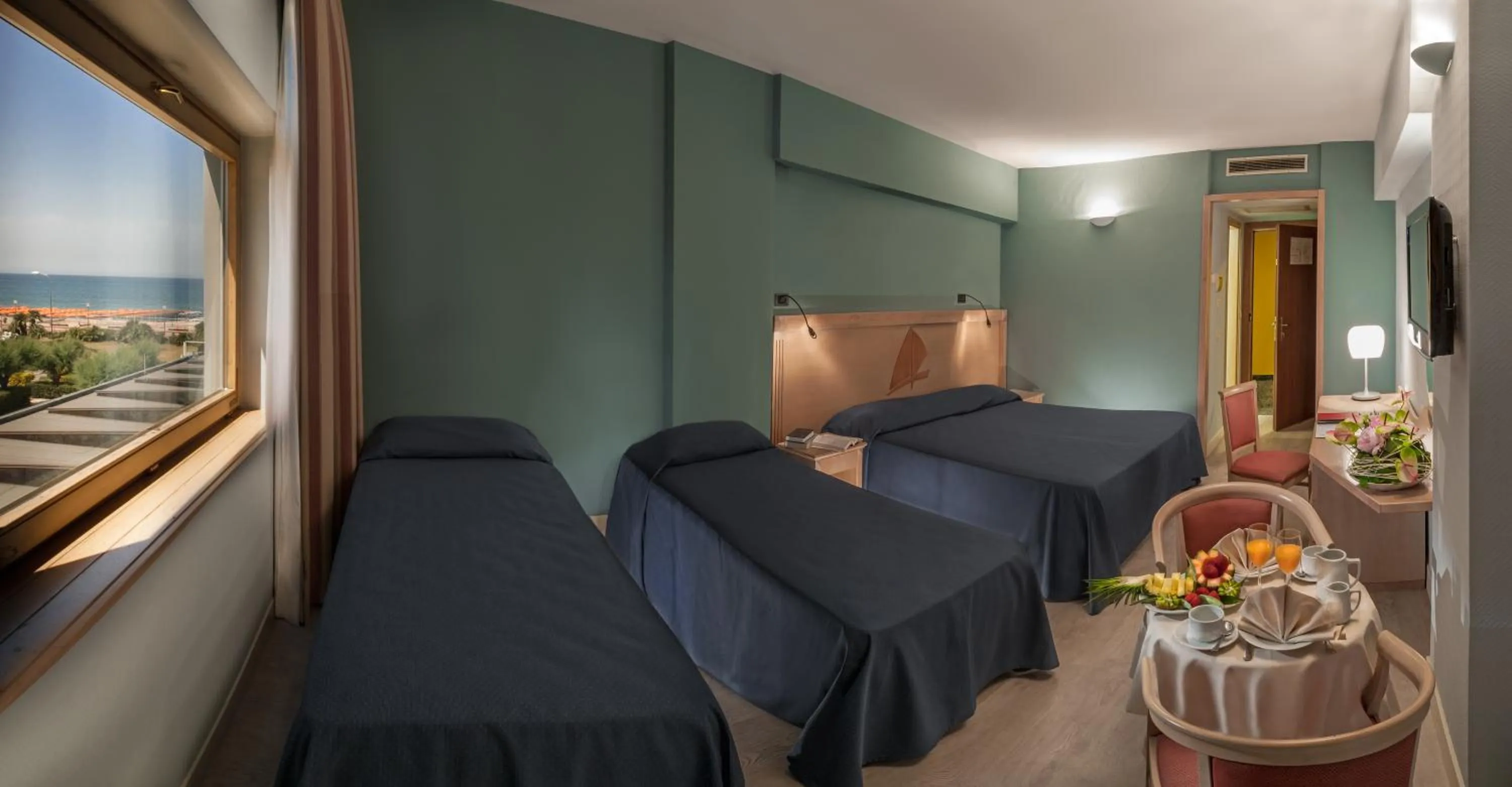 Quadruple Room in Grand Hotel Continental