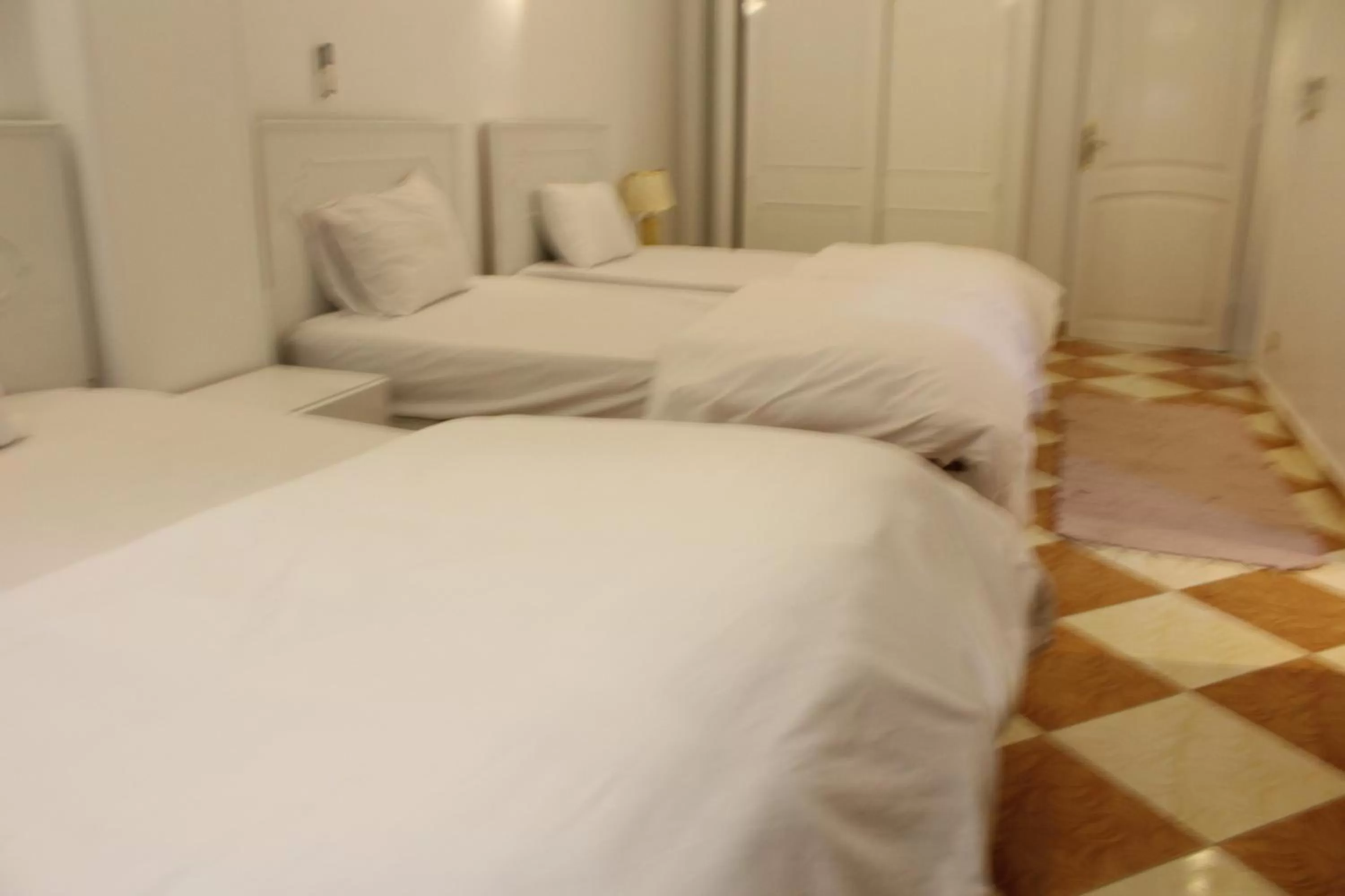 Bed in Mama Africa Apts & Studios