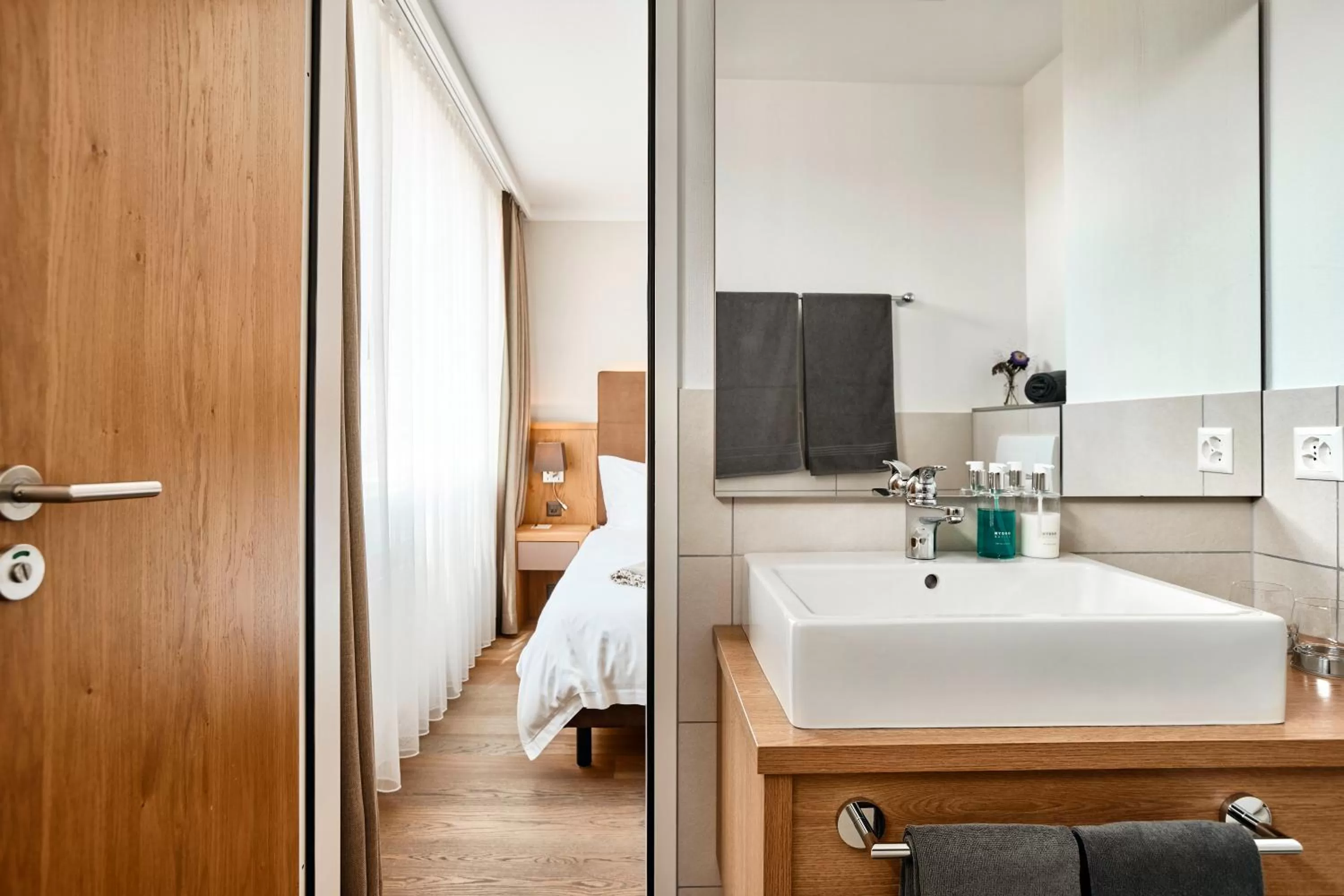 Bathroom, Bed in Victoria - Alpine Boutique Hotel & Fine Dining