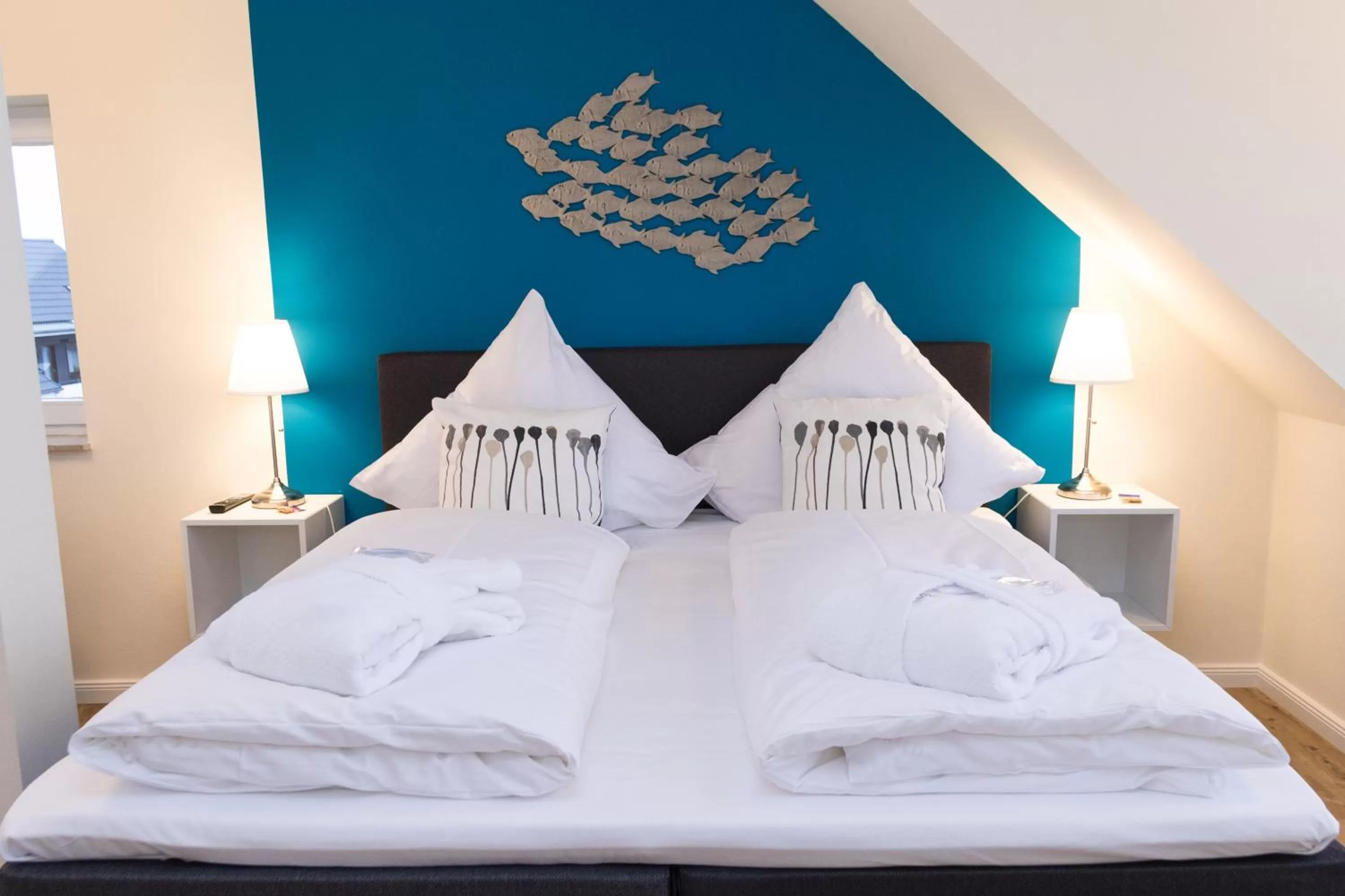 Photo of the whole room, Bed in Das Frühstückshotel Büsum