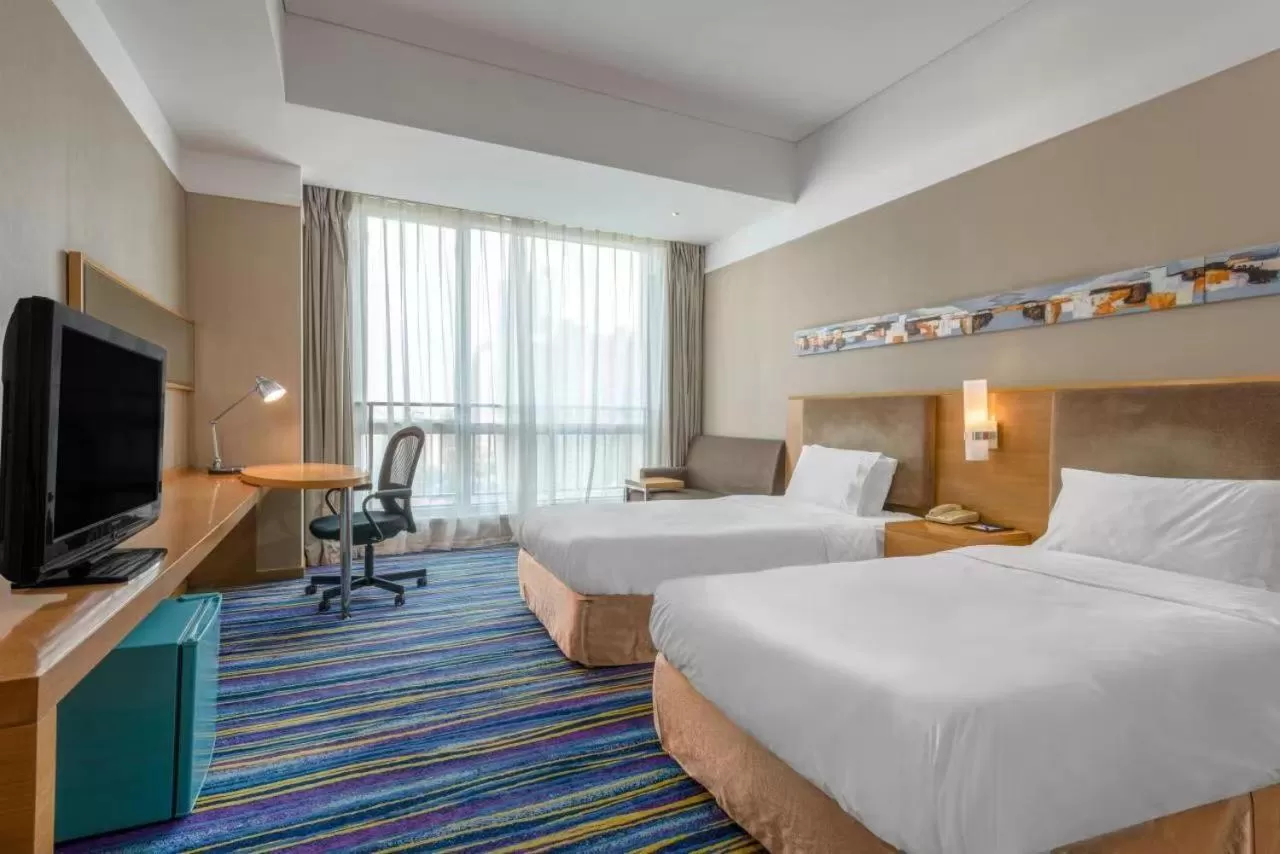 Bed in Holiday Inn Express Tianjin Heping by IHG