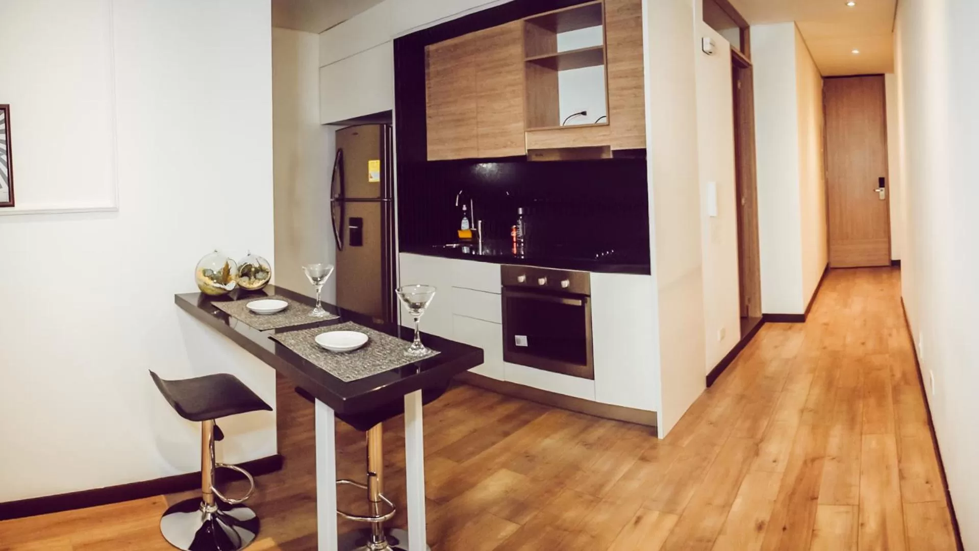 Kitchen or kitchenette in Hemma Bogotá Country Luxury Suites Hotel