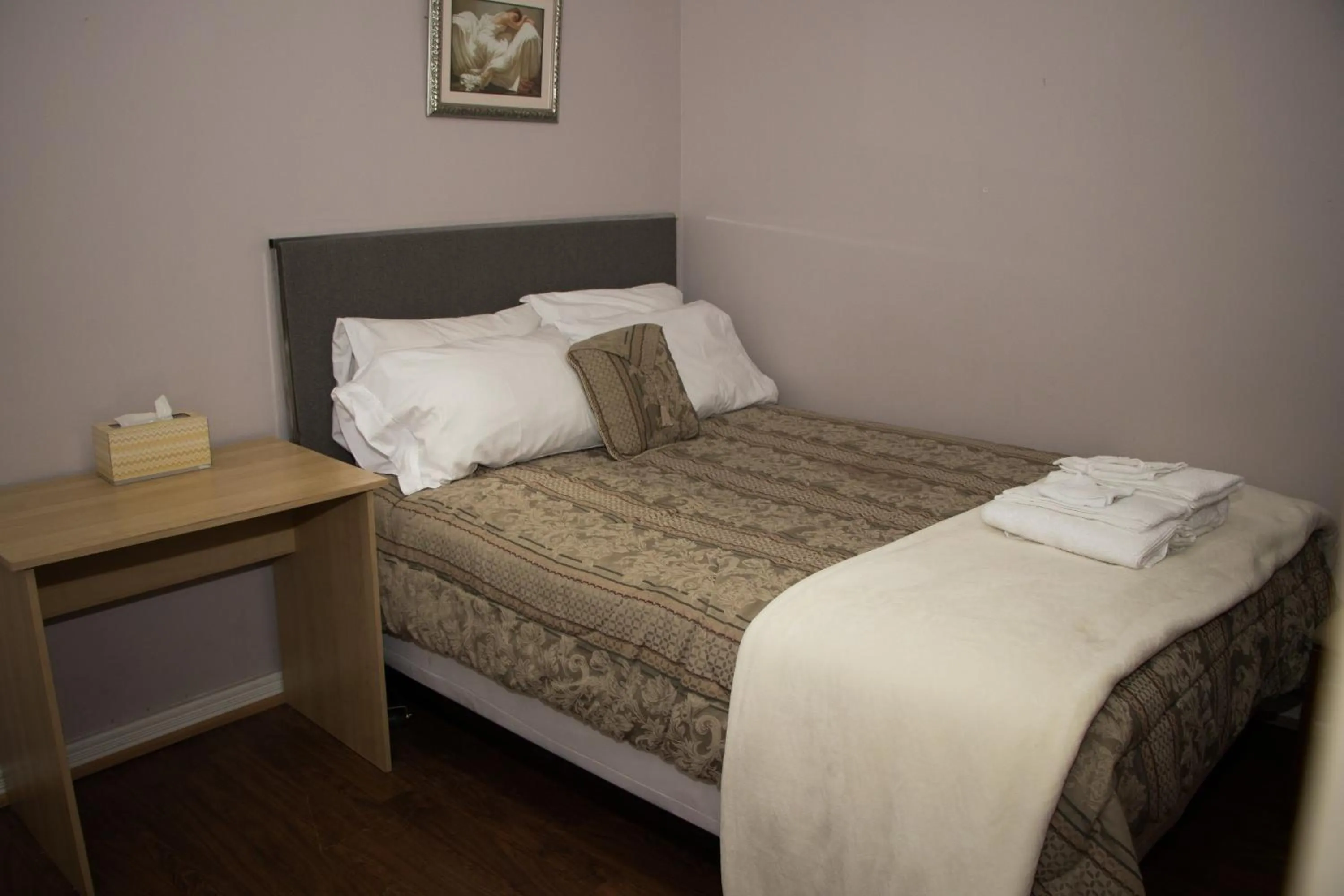 Bed in Saint Lawrence Residences and Suites