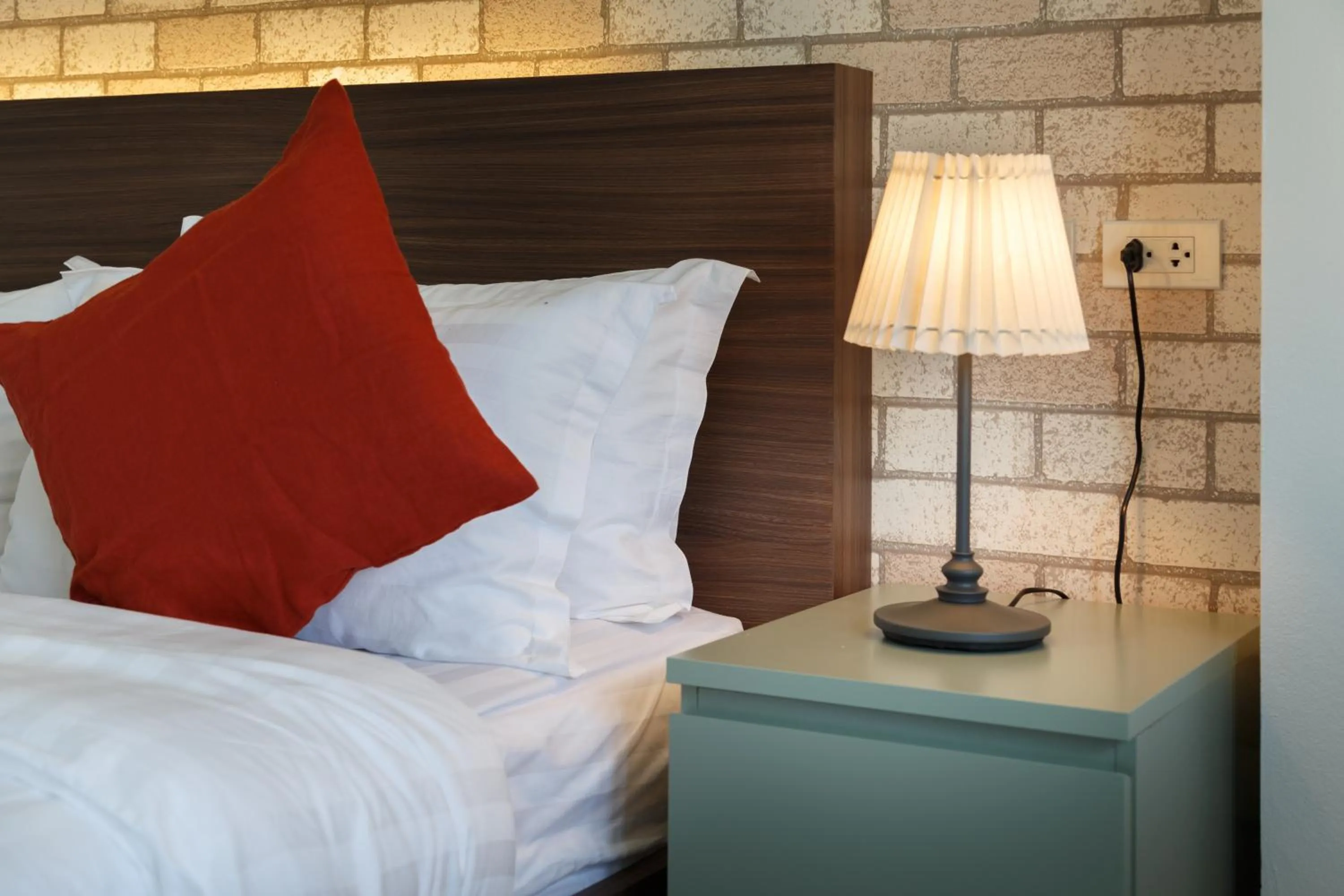 Bed in Q Space Residence