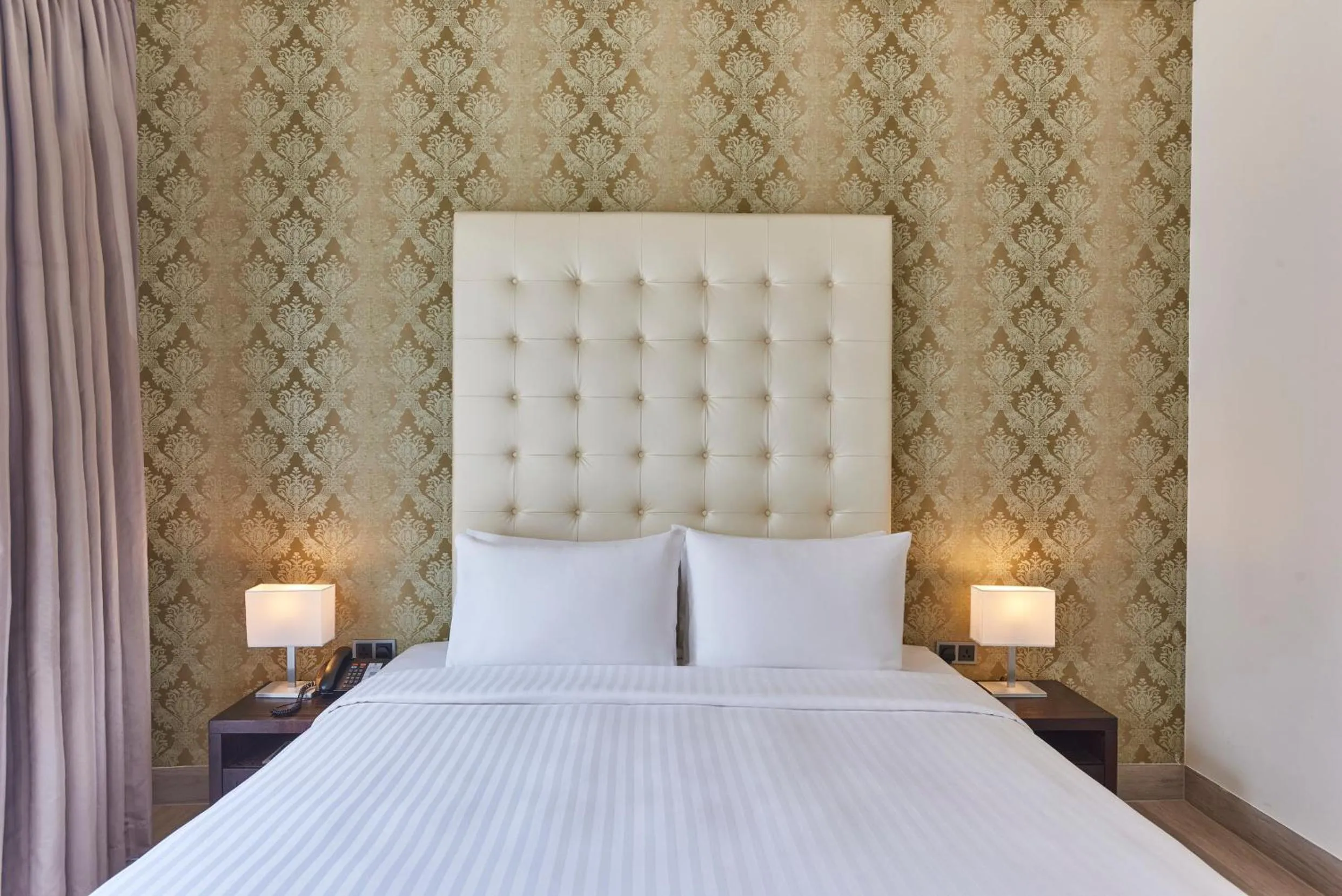 Bed in Village Hotel Albert Court by Far East Hospitality