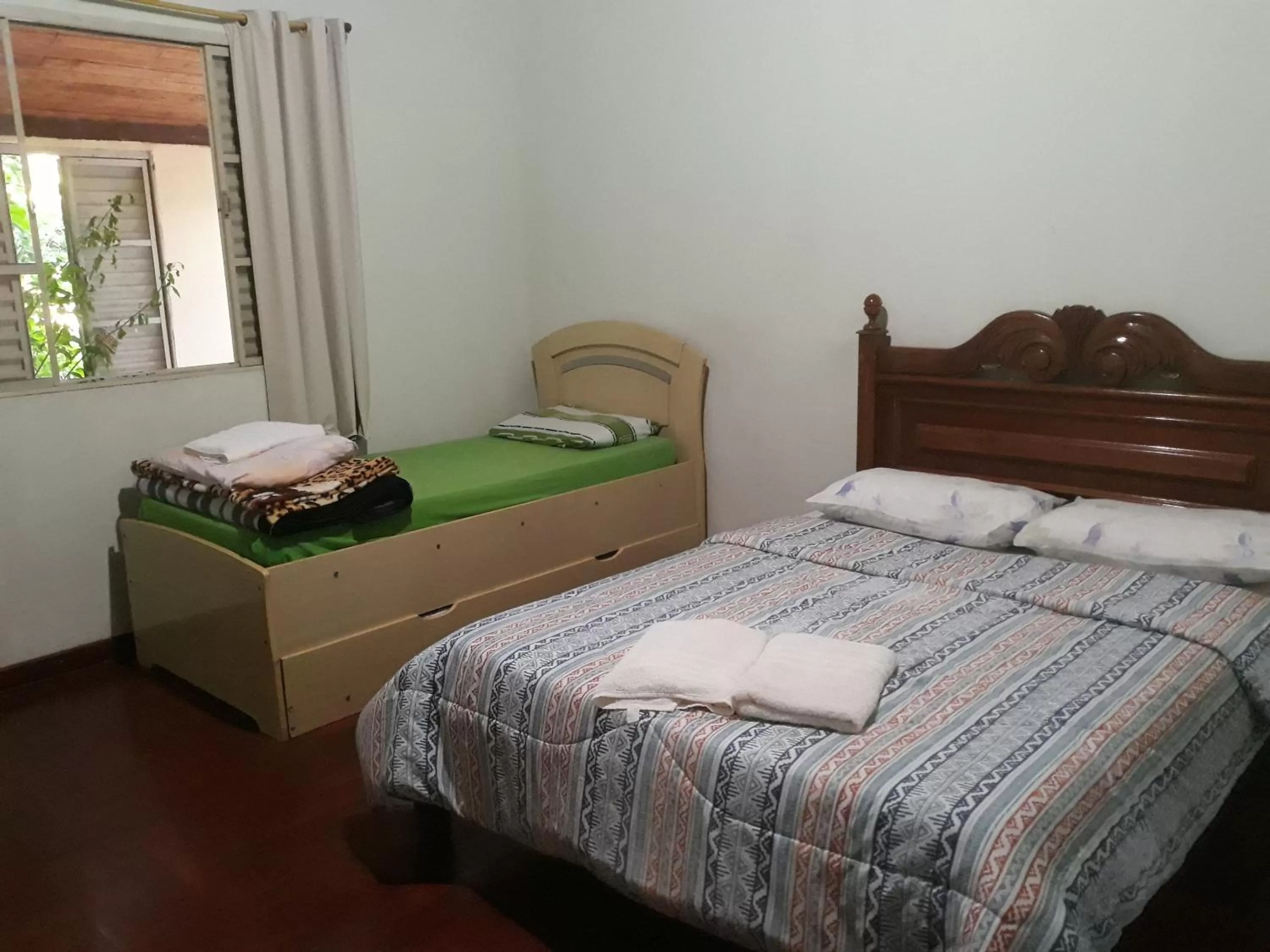 Bed in Pousada do Ribeirão