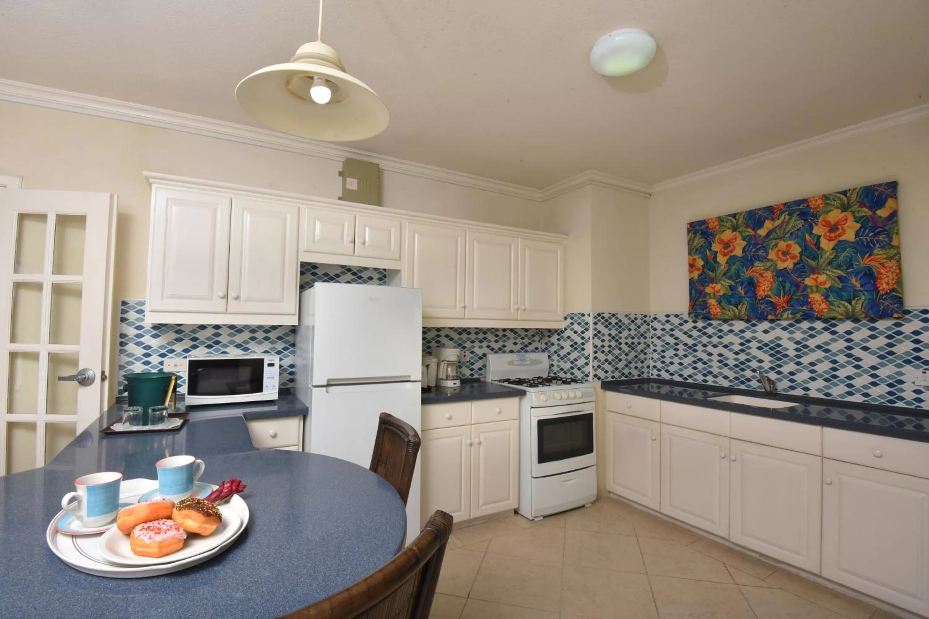 Kitchen or kitchenette in Coral Mist Beach Hotel