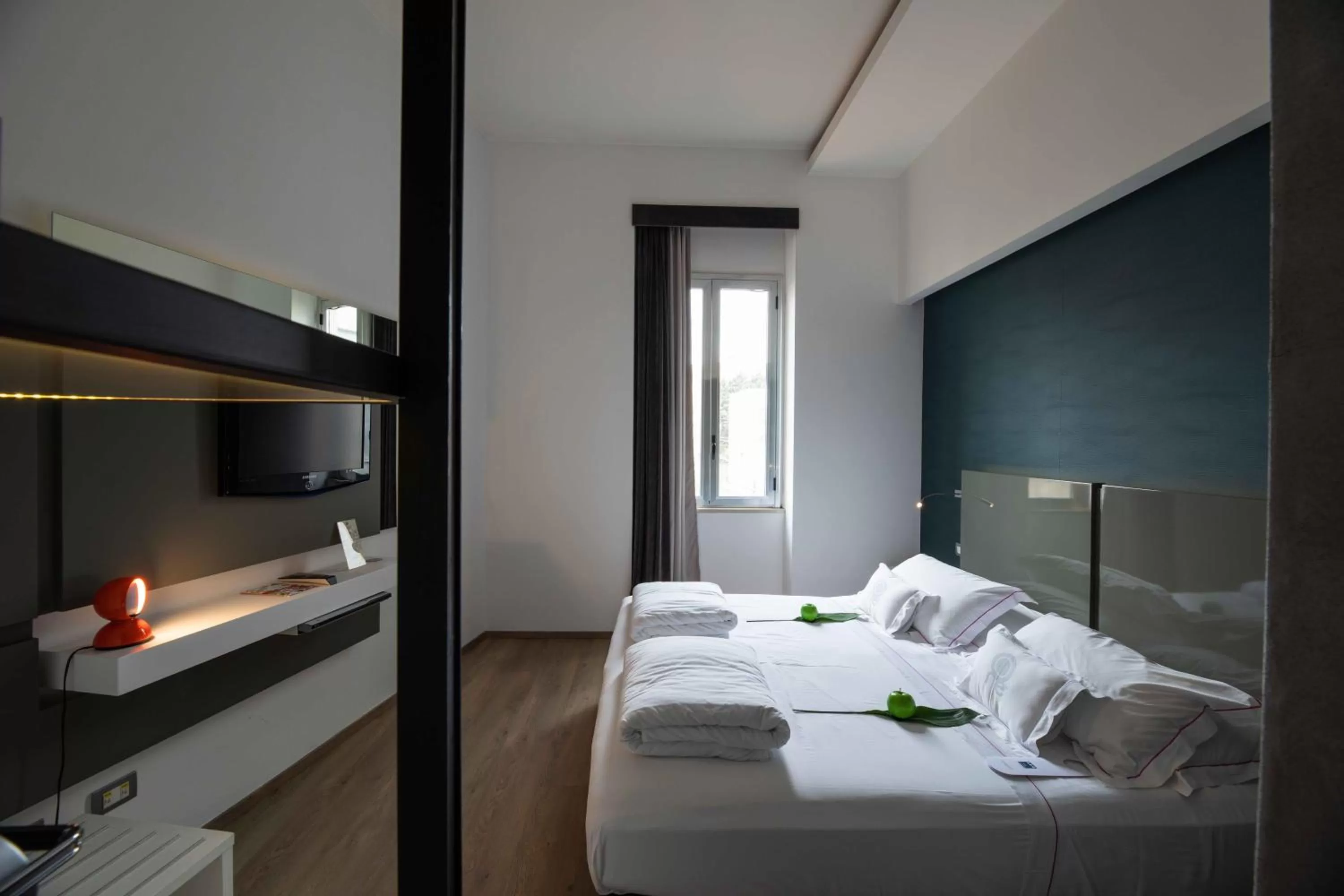 Bed in UNA HOTELS One Siracusa