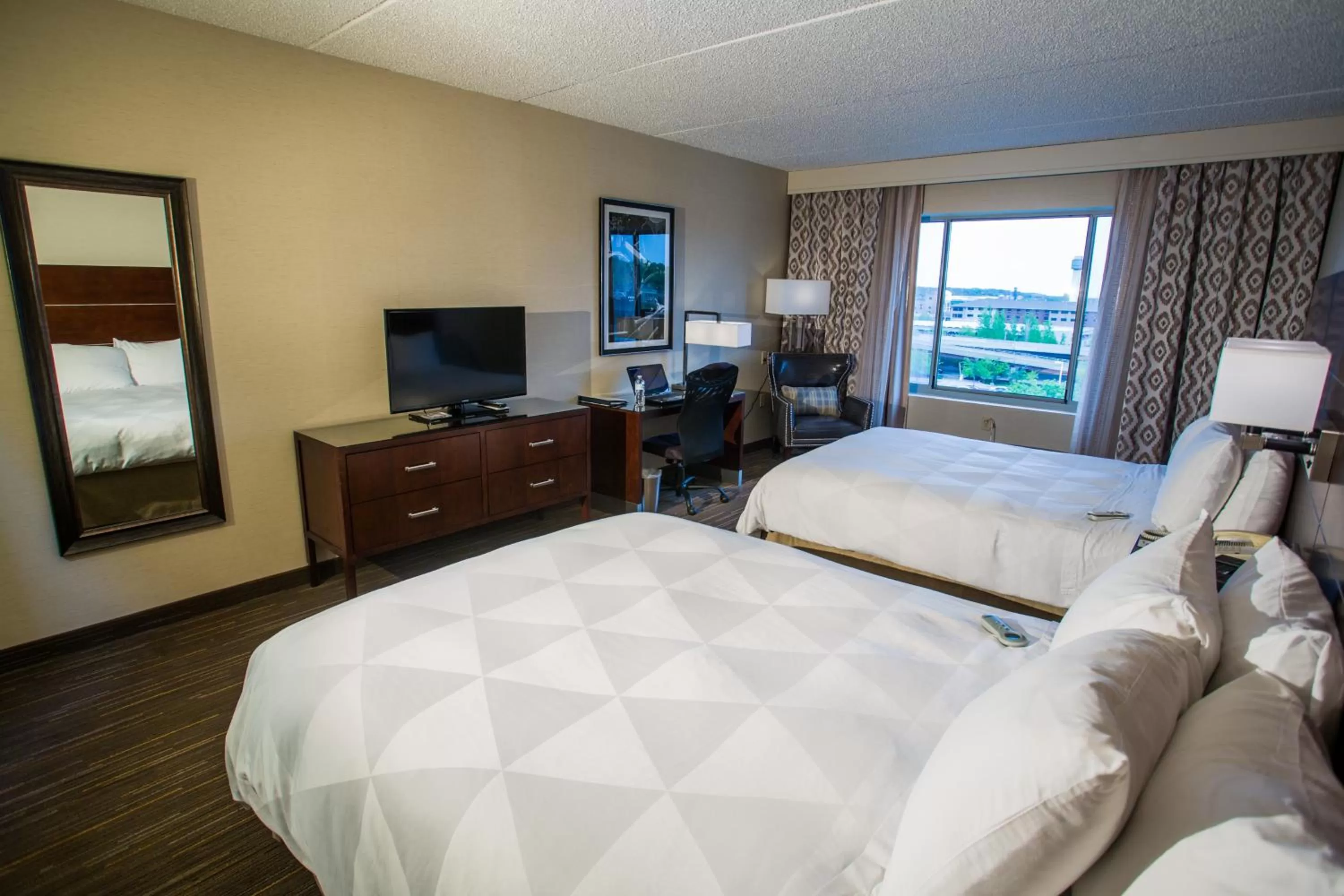 Photo of the whole room, Bed in Wyndham Moline on John Deere Commons