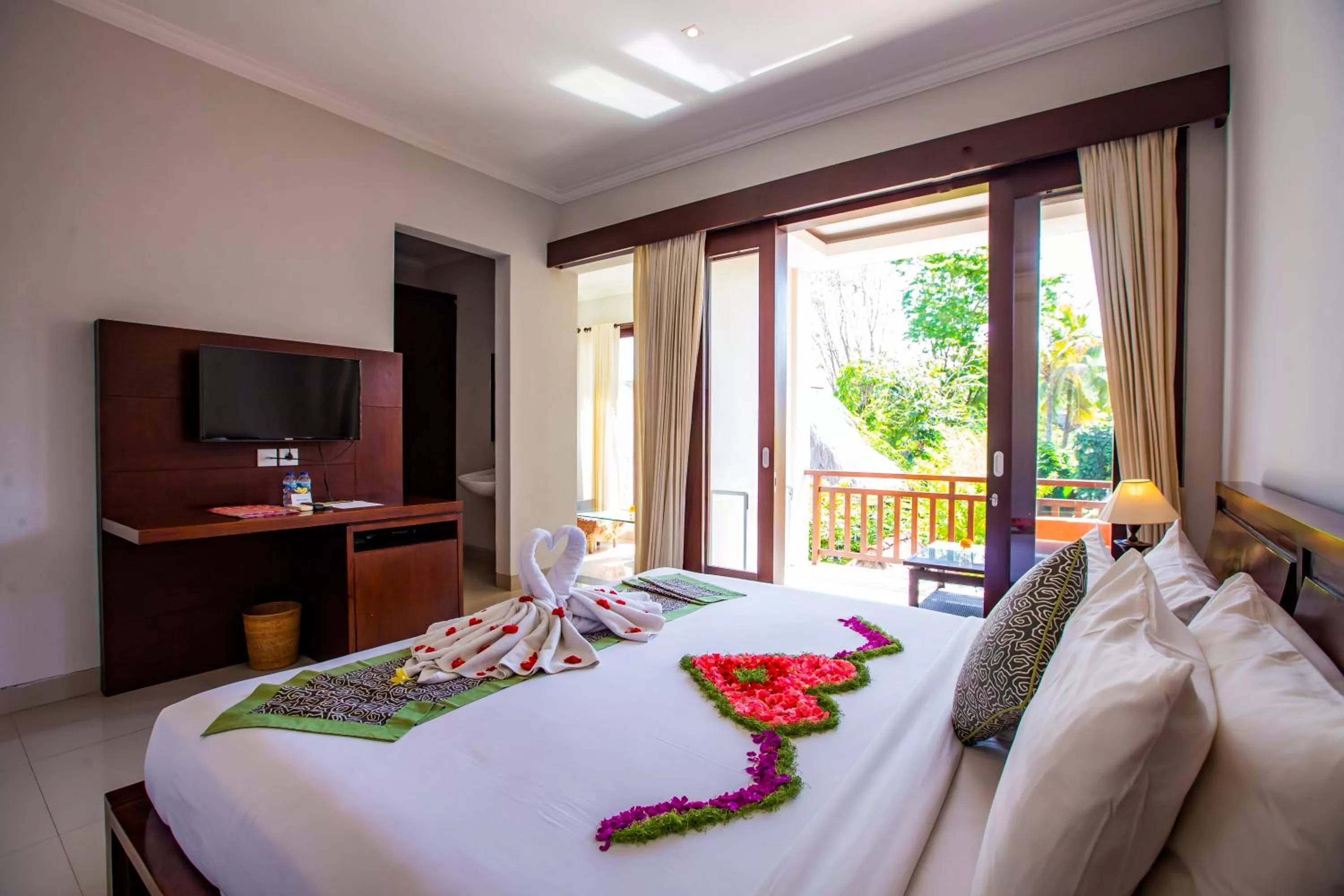 Bed in Lili Cottage Ubud