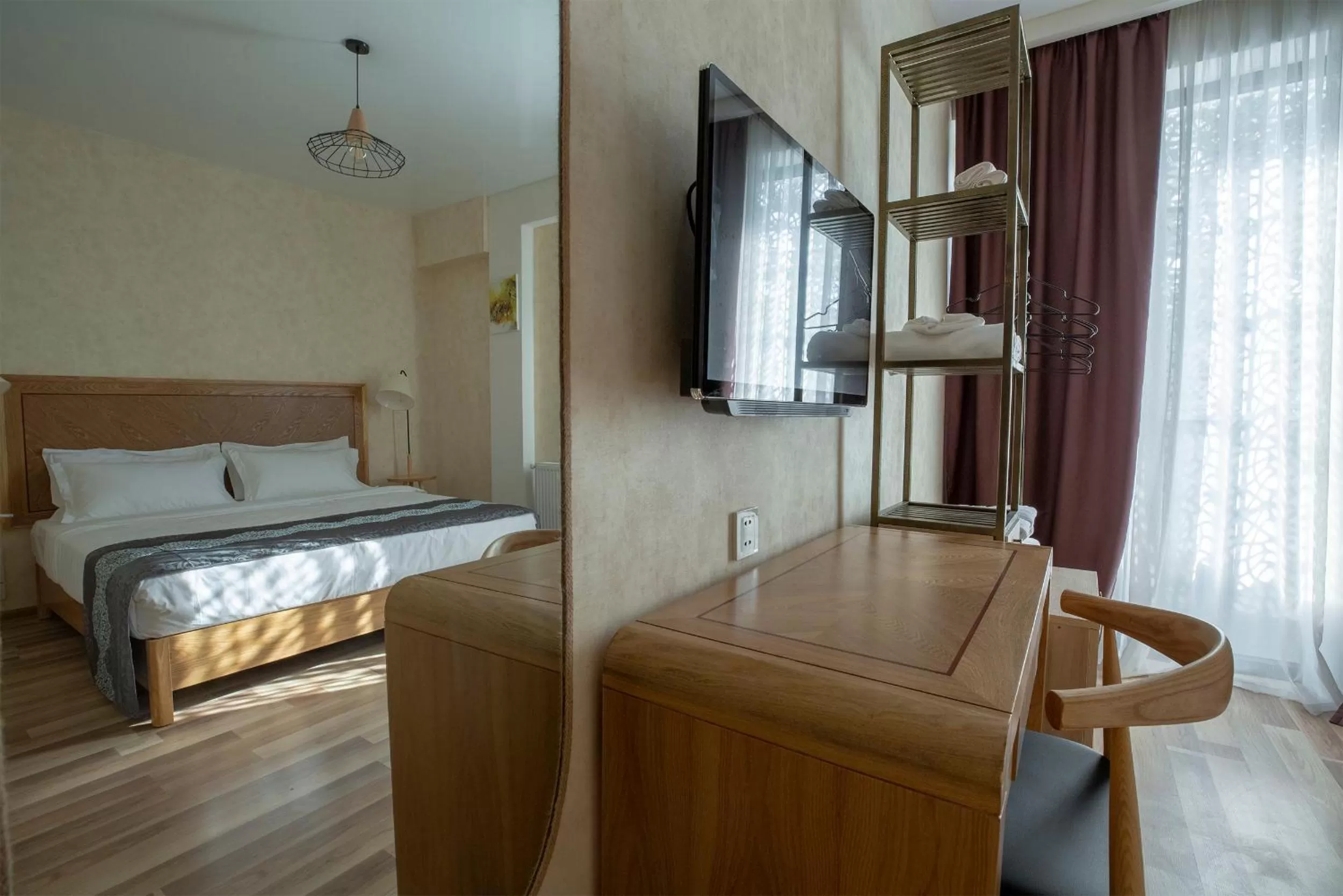 Communal lounge/ TV room, Bed in Ornament Boutique Hotel