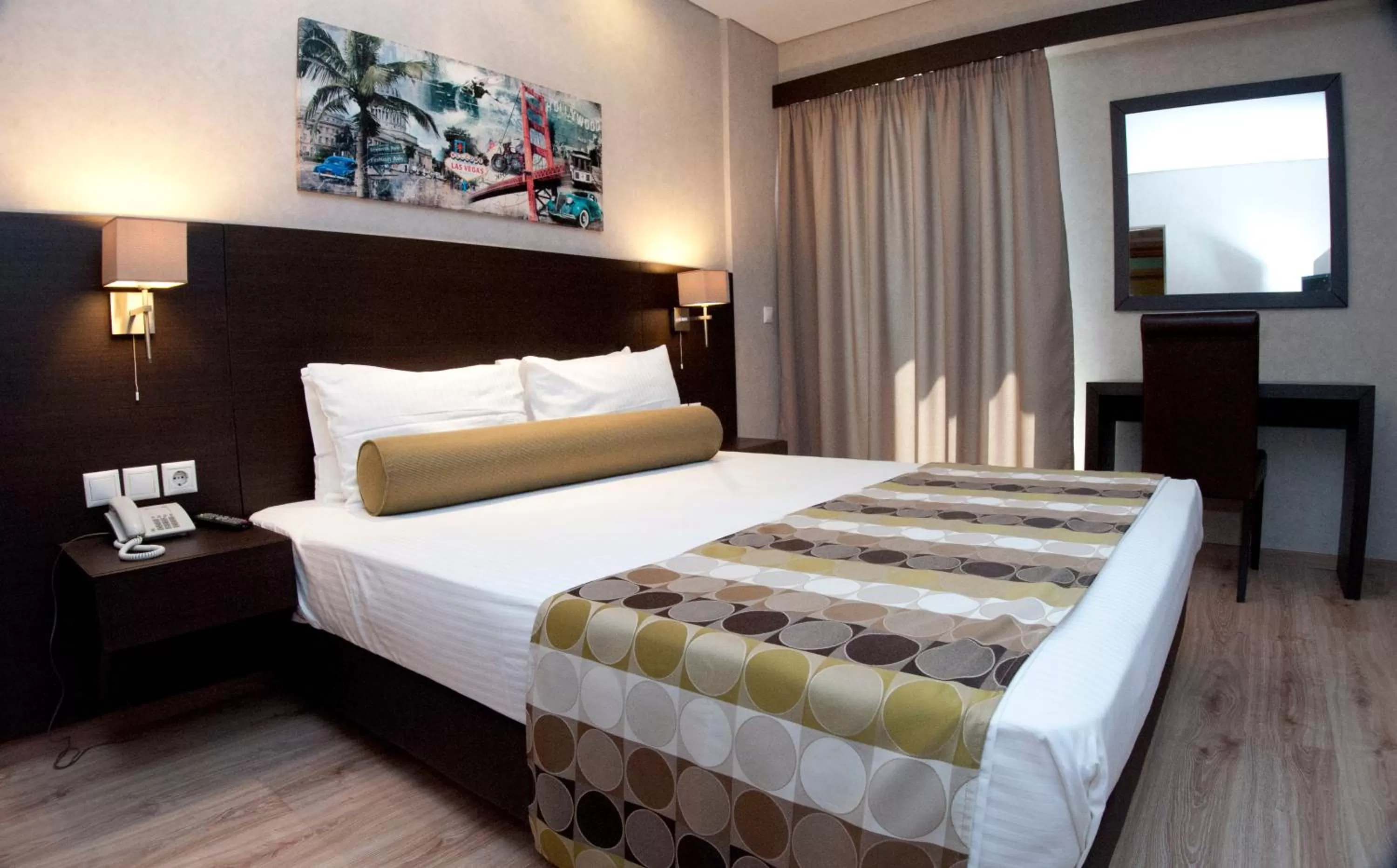 Bed in Nefeli Hotel Alimos