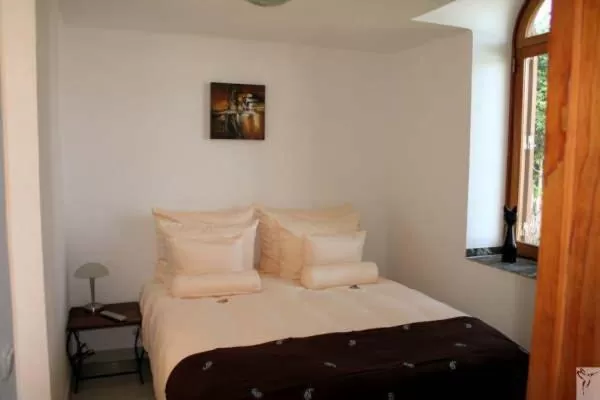 Bed in Birdcage Gay Men Resort and Lifestyle Hotel