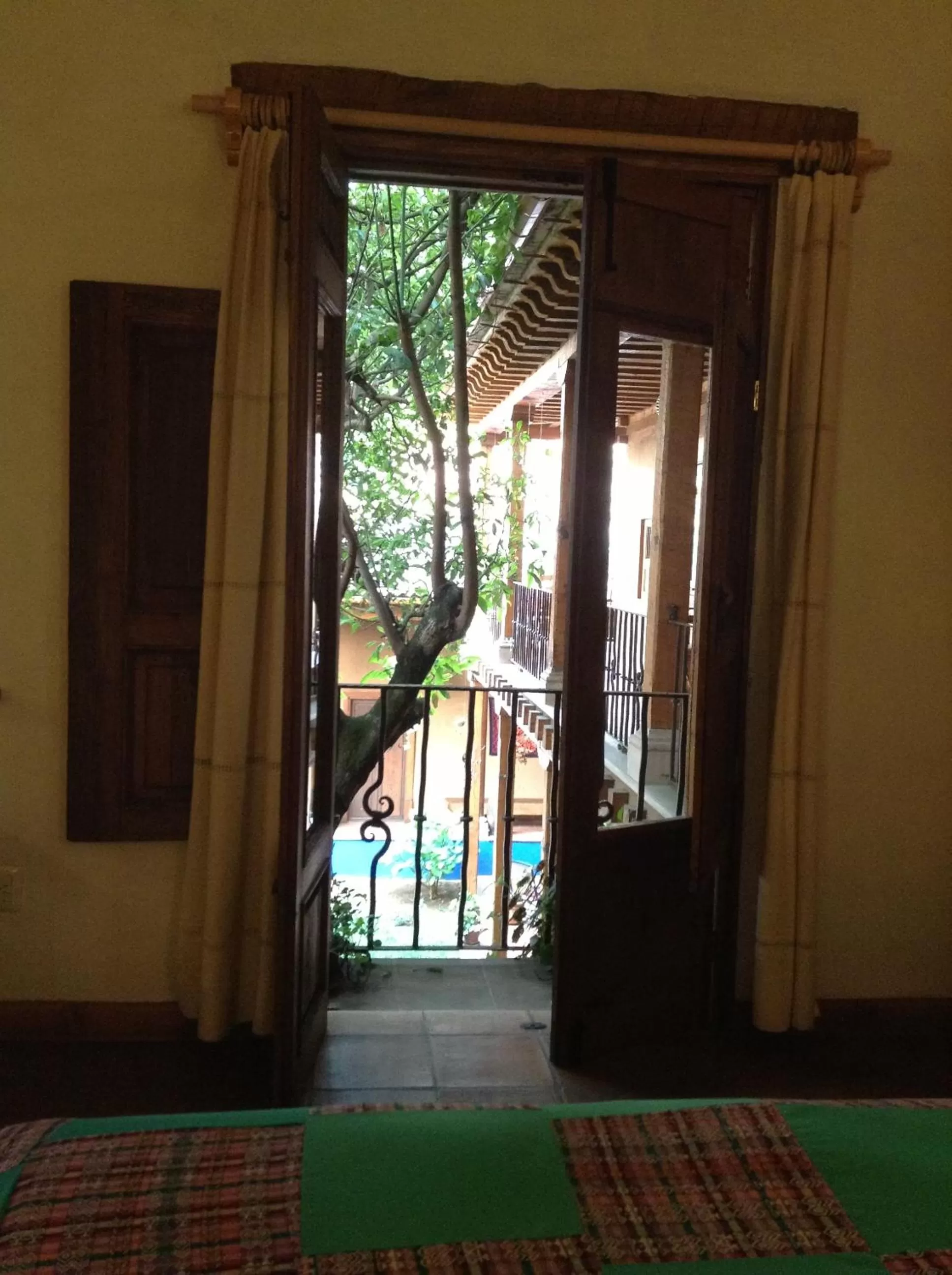 Photo of the whole room, Bed in Posada Yolihuani