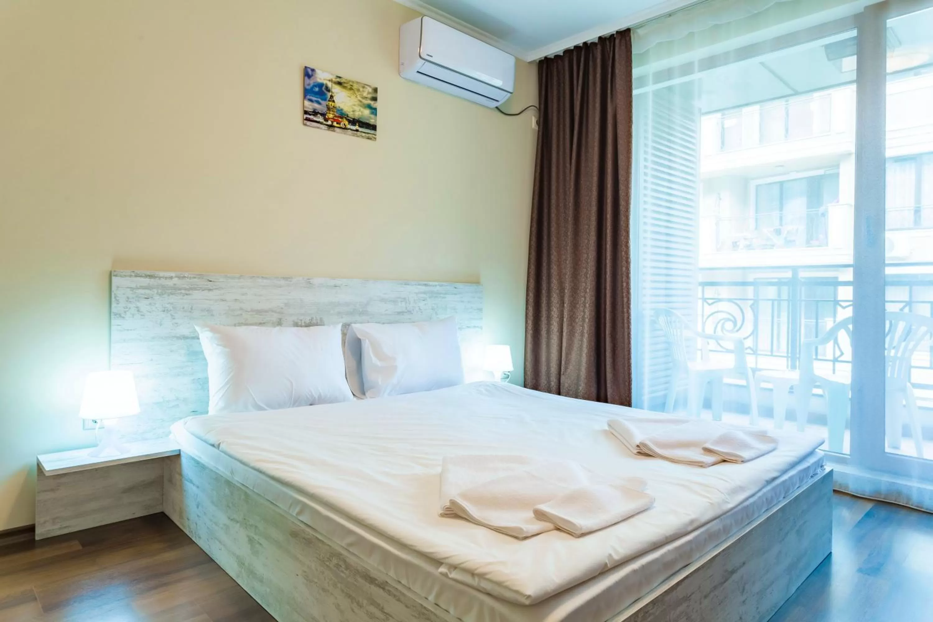 Bed in Rose Gardens Apart Hotel