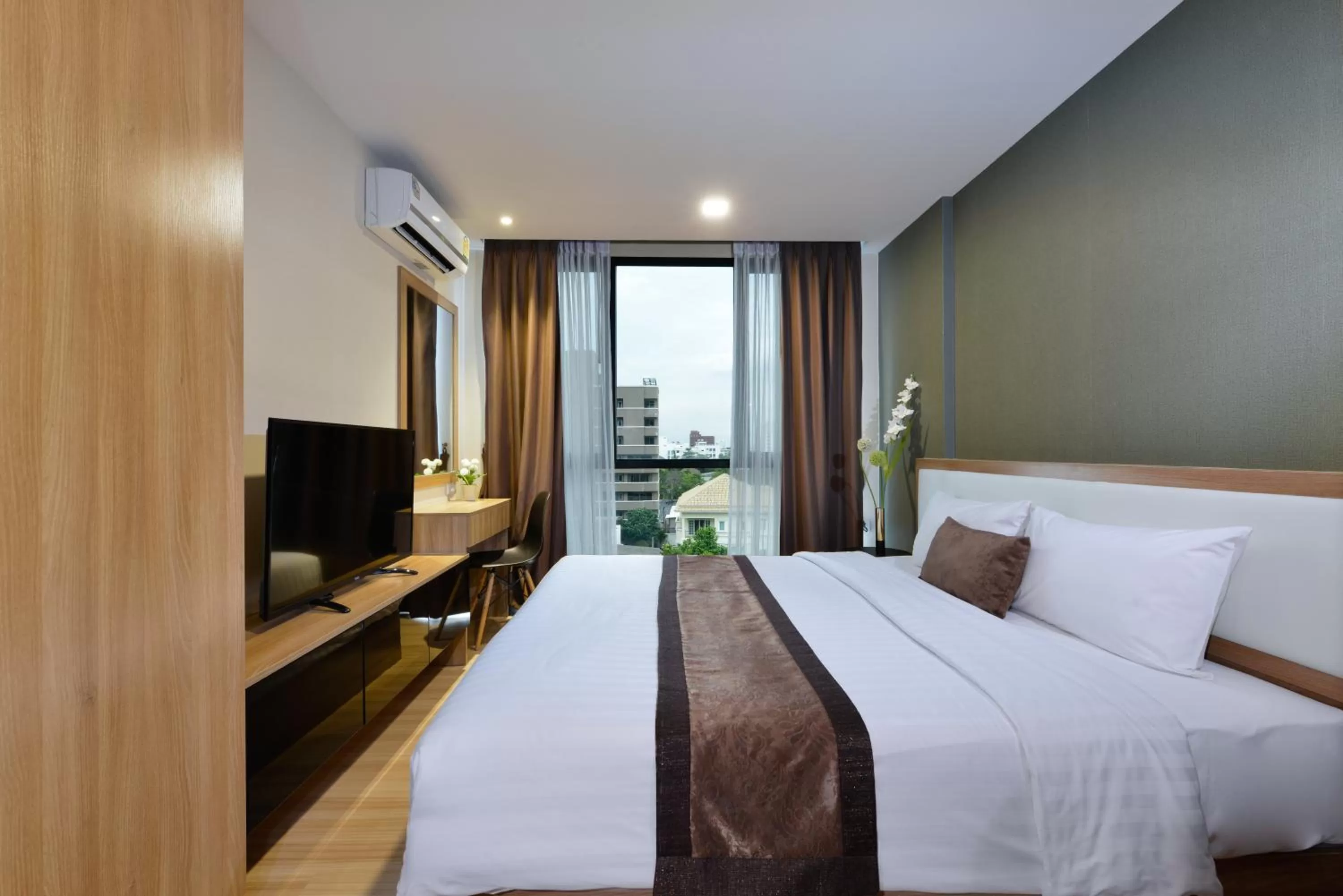 Bedroom in Ramada by Wyndham Bangkok Ten Ekamai Residences