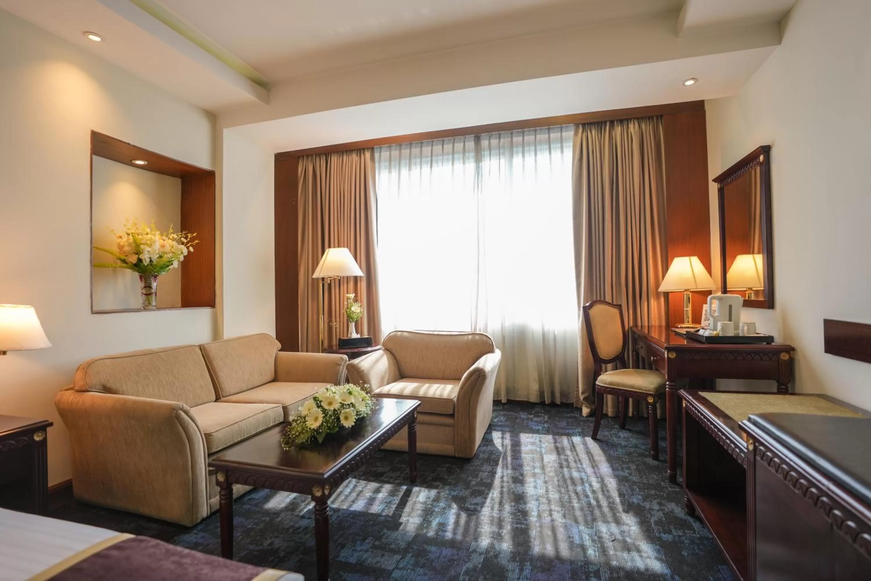 Seating area, Bed in Hotel Sarina