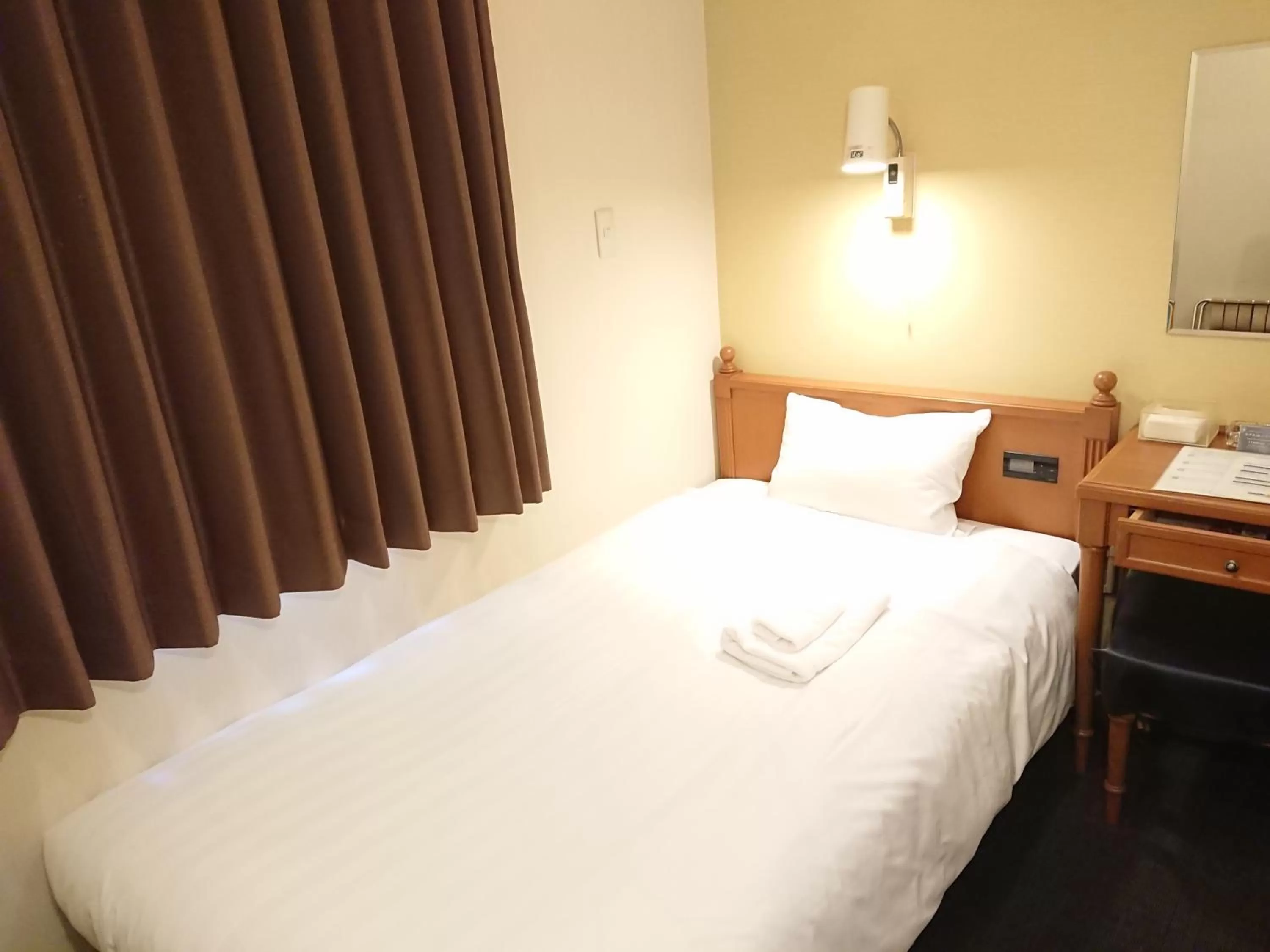 Photo of the whole room, Bed in Smile Hotel Kobe Motomachi