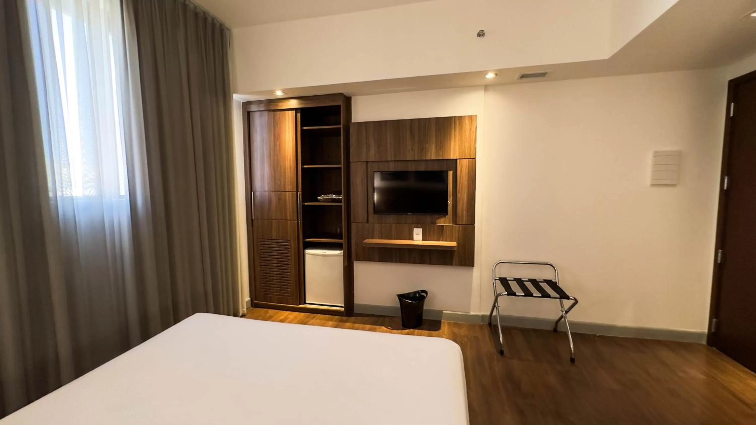 Photo of the whole room, Bed in Hotel Vivenzo Savassi Belo Horizonte