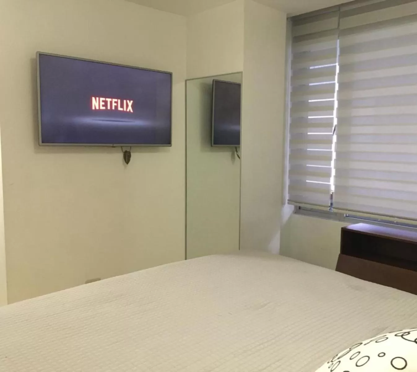 Bedroom, TV/Entertainment Center in Misuitehotel La Carolina Quito