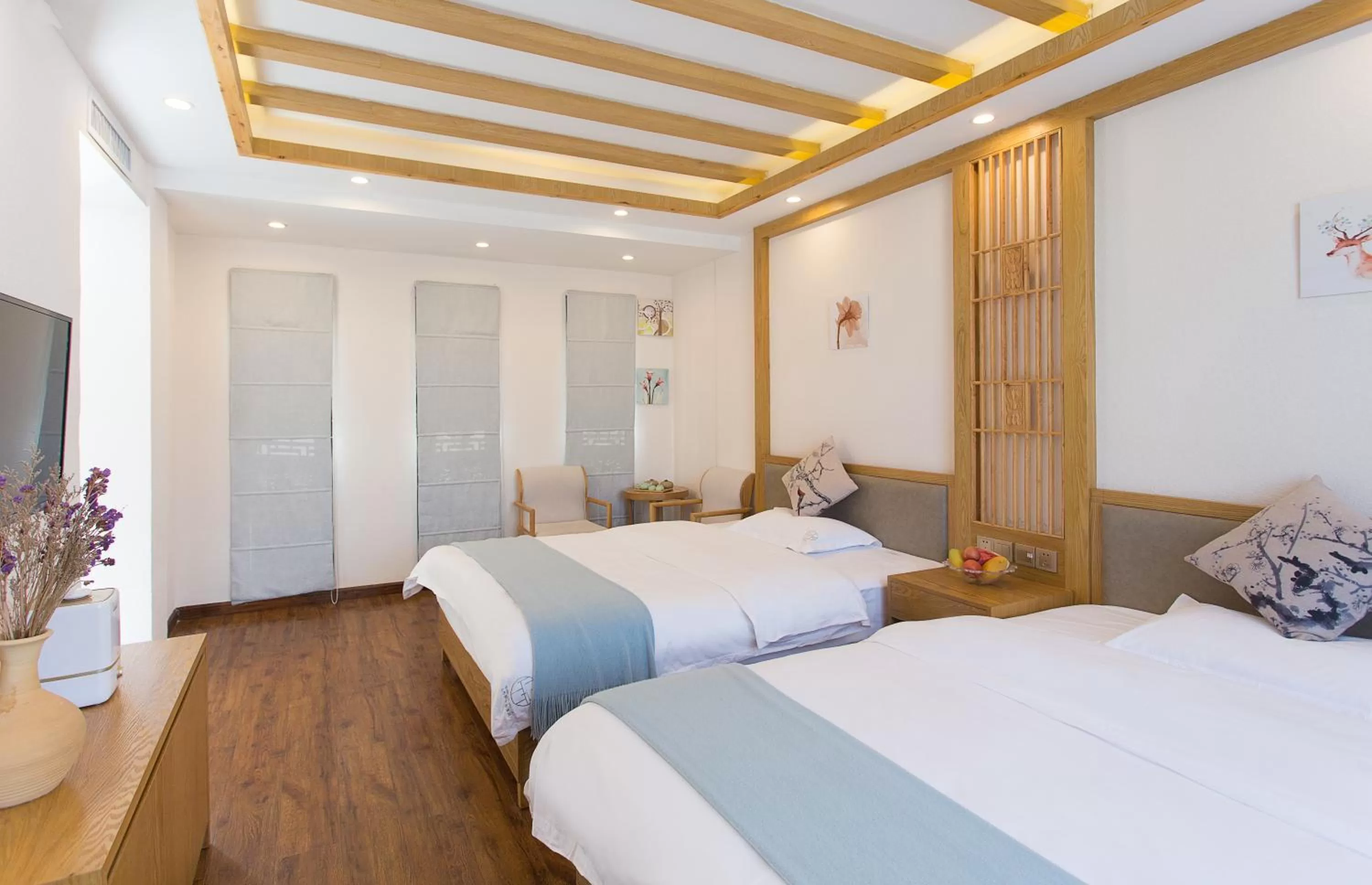 Bed in Lijiang Gemmer Hotel